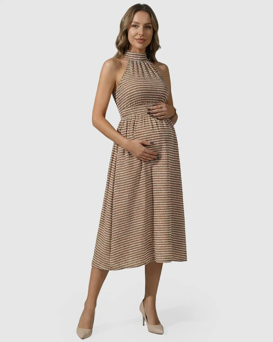 Maternity midi dress with halter mock neck, geometric print, and high-line silhouette, in four-way stretch polyester.