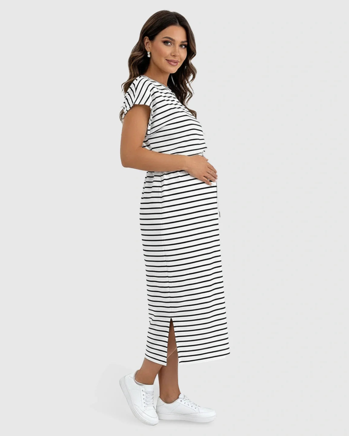 Maternity midi dress with black and white horizontal stripes, cap sleeves, adjustable waist, and side slits.