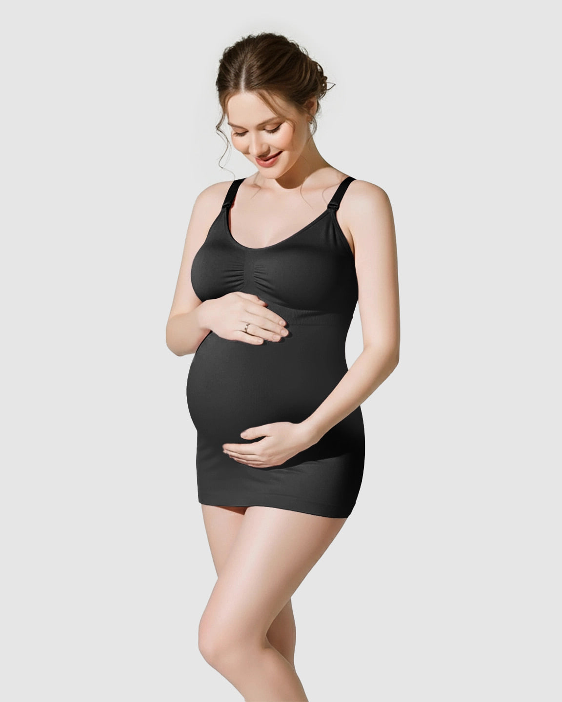 Pregnant woman in a black soft stretch front-opening wireless maternity nursing bra and matching tank.