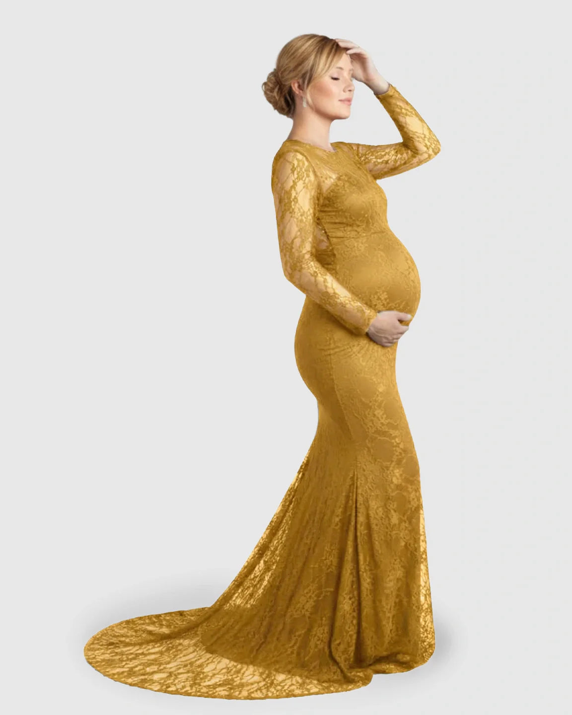Pregnant woman in a golden sheer lace trumpet maternity gown with long sleeves and a mermaid skirt.