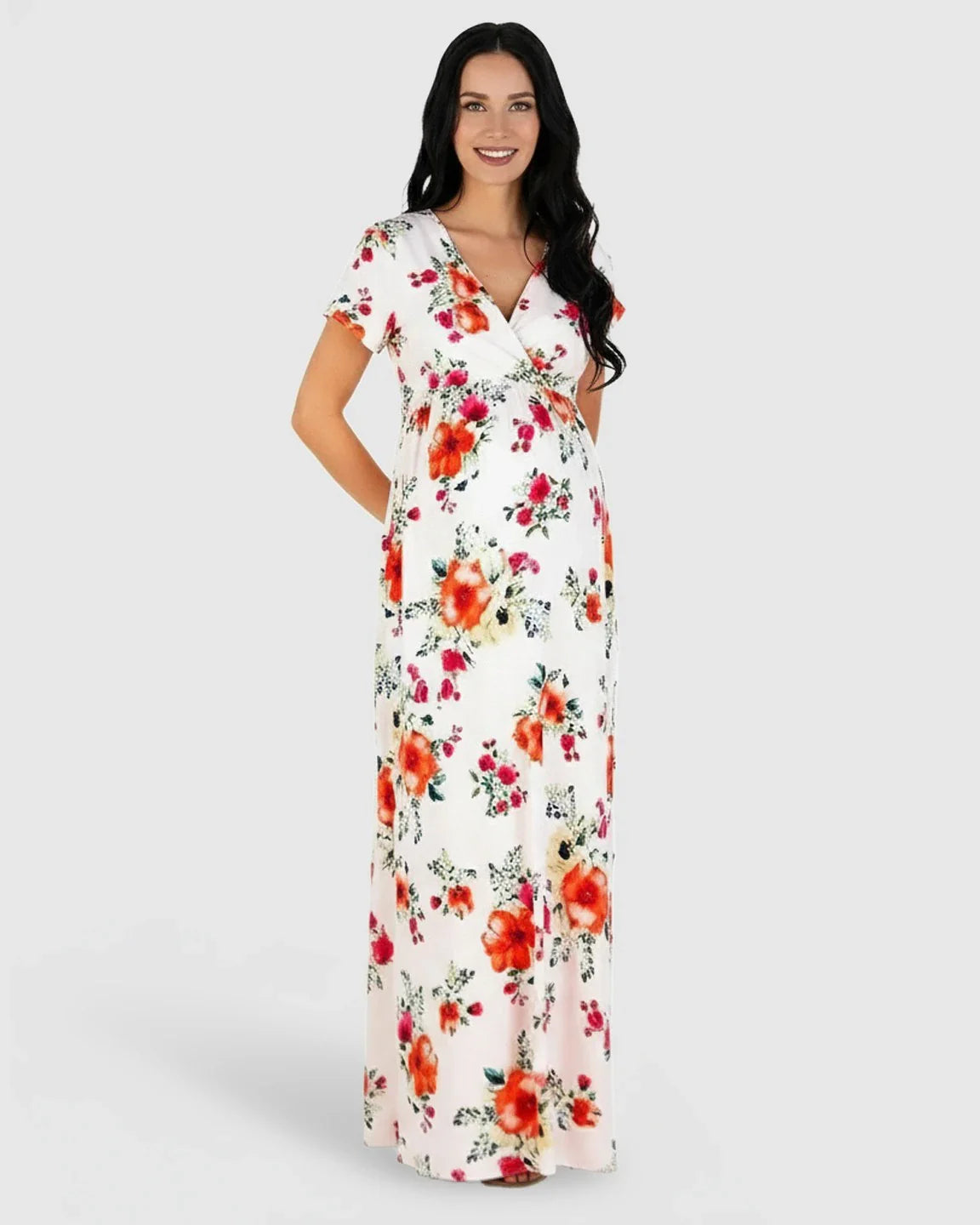 White floral V-neck short sleeve maternity maxi dress with red and orange flowers.