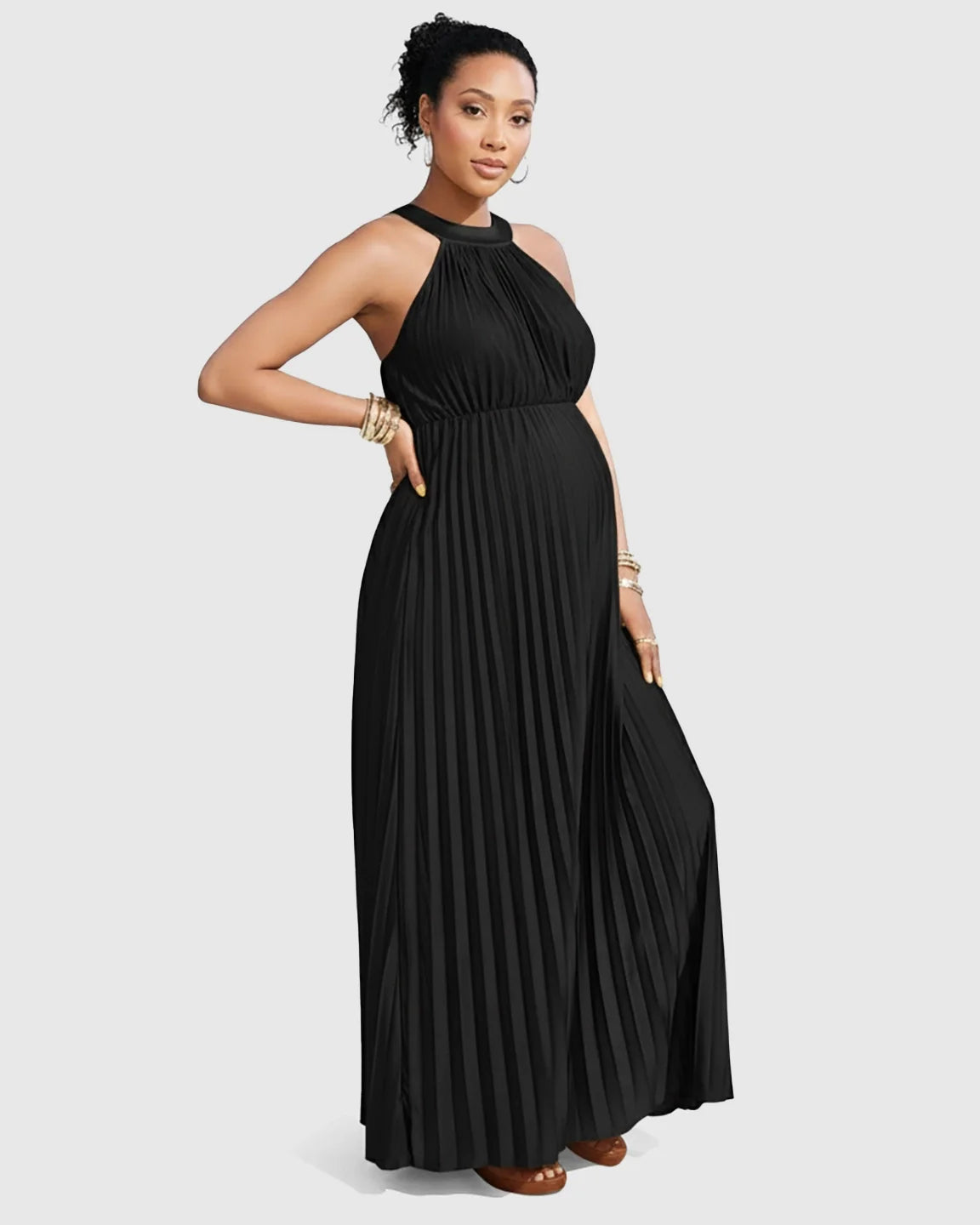 Black faux silk halter neck pleated maternity maxi dress with flowing silhouette.