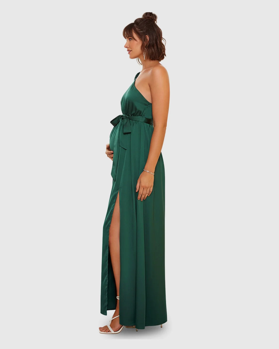 Elegant emerald green satin one-shoulder maternity maxi dress with a high slit and tie-waist.
