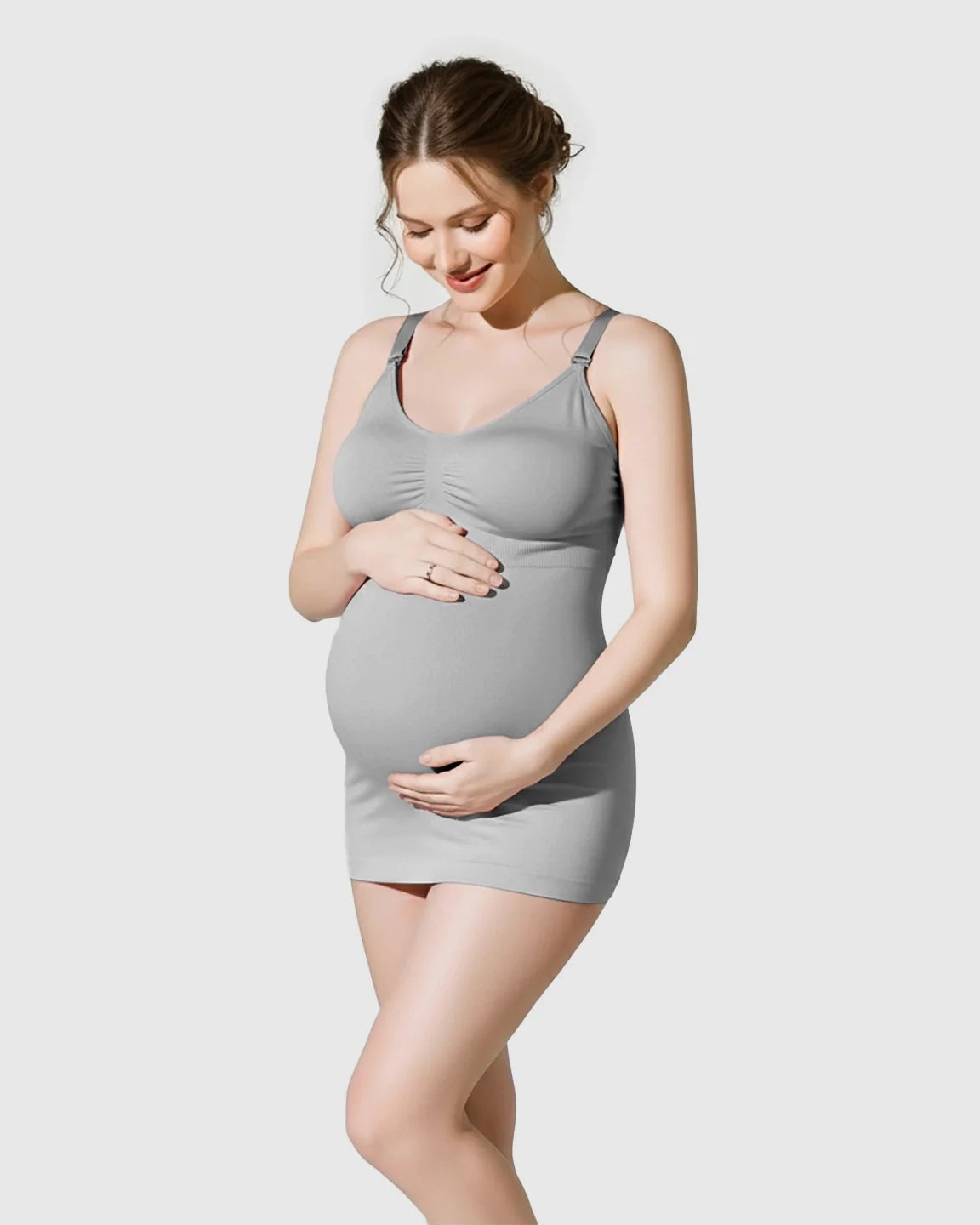 Pregnant woman wearing a gray, ribbed, soft stretch maternity nursing camisole with adjustable straps.