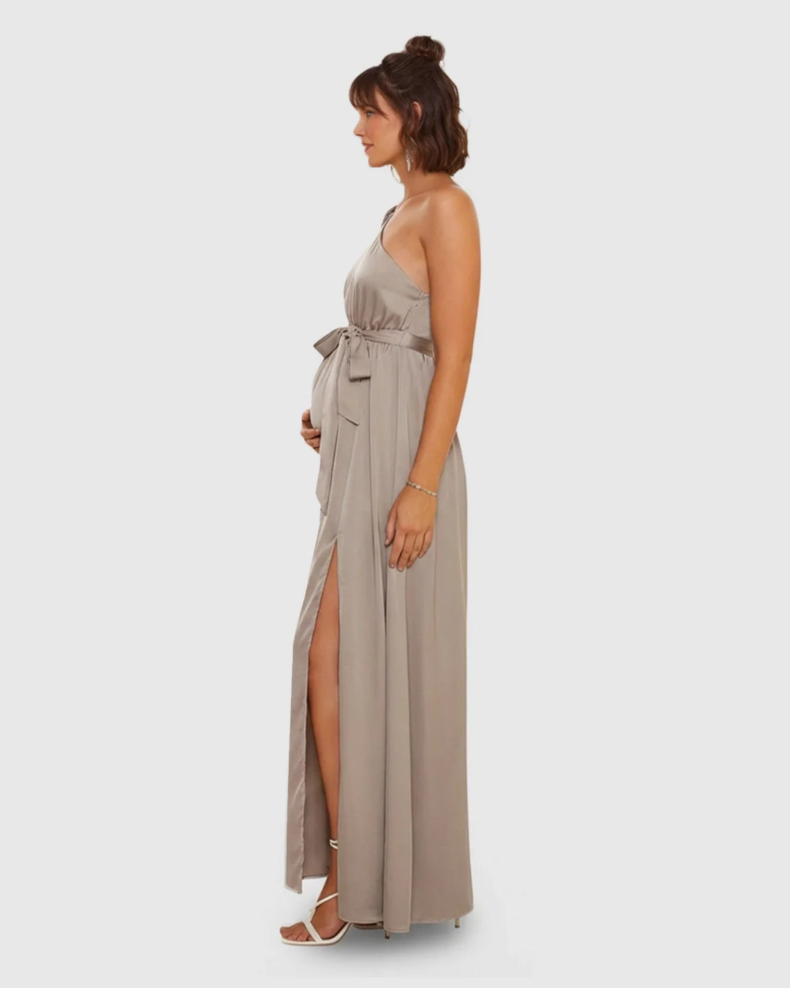 Elegant taupe satin one-shoulder maternity maxi dress with a high slit and tie-waist detail.