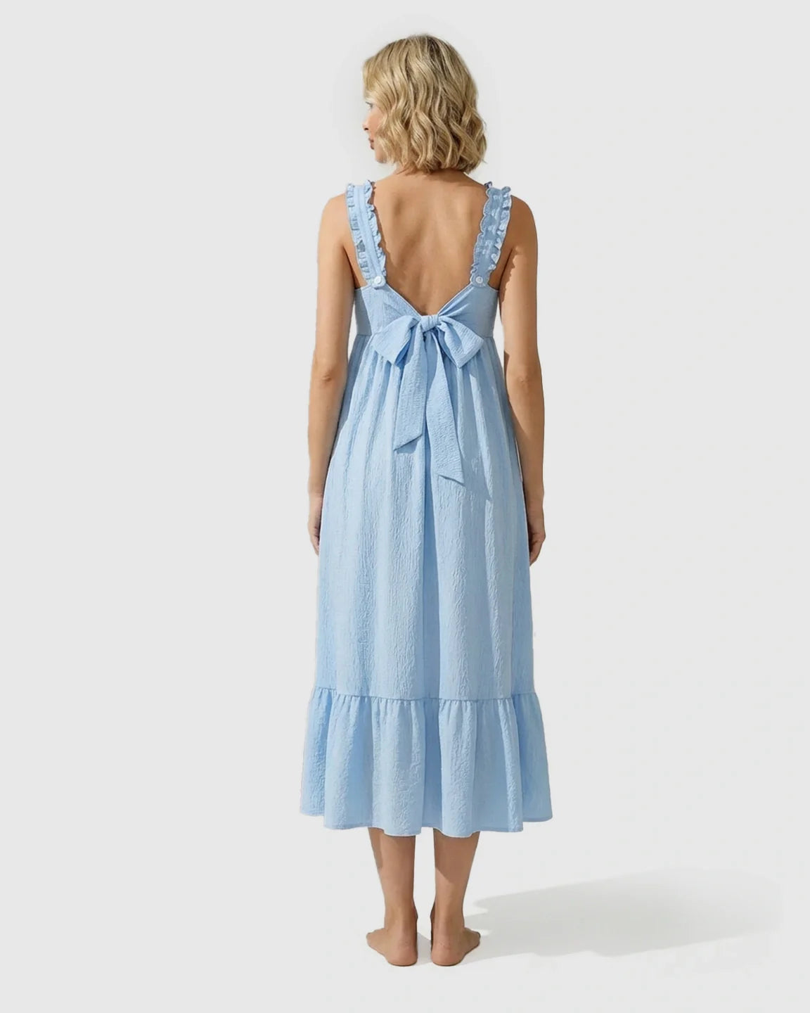 Light blue tiered maternity maxi dress with ruffled straps and a back bow tie.