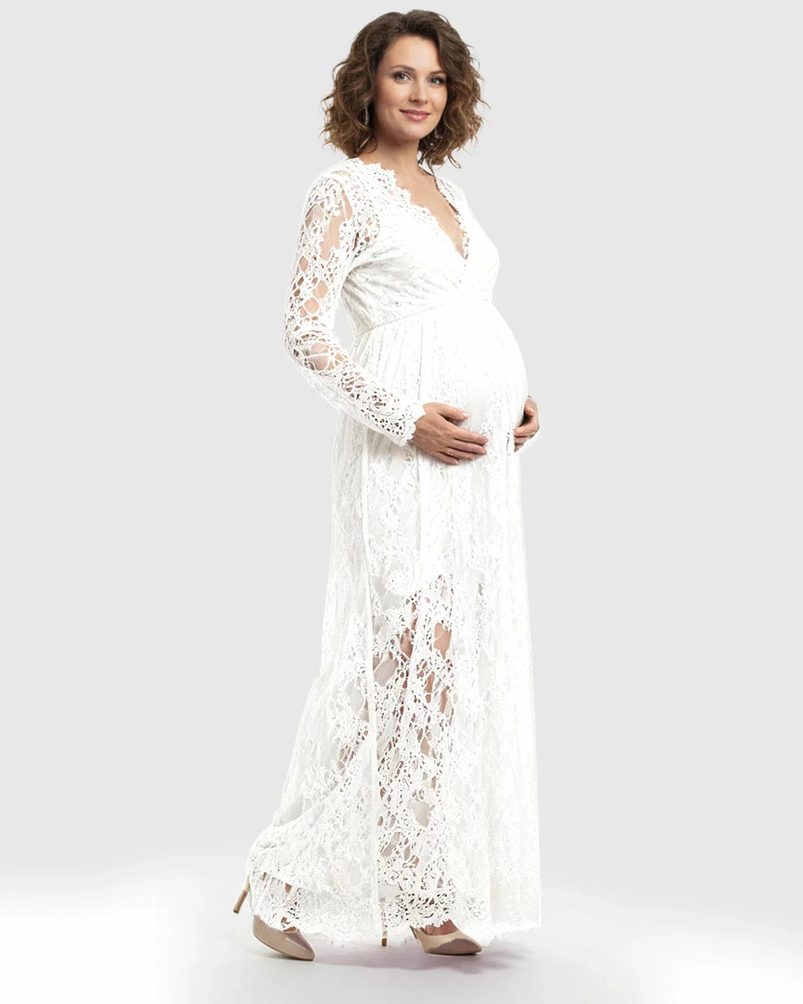 White sheer floral lace empire waist maternity maxi dress with long sleeves.