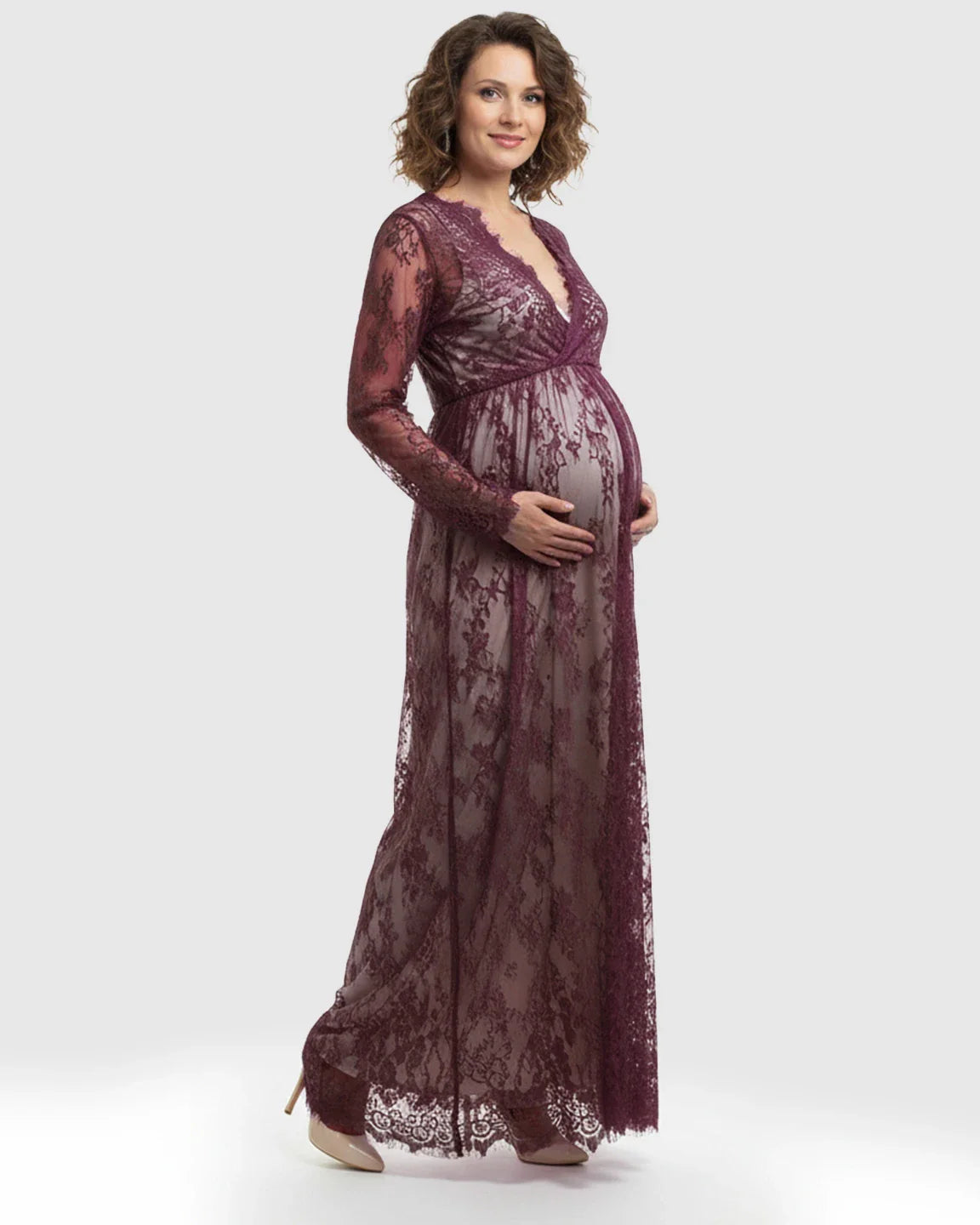Sheer floral lace empire waist maternity maxi dress in deep plum, with a V-neck and long sleeves.