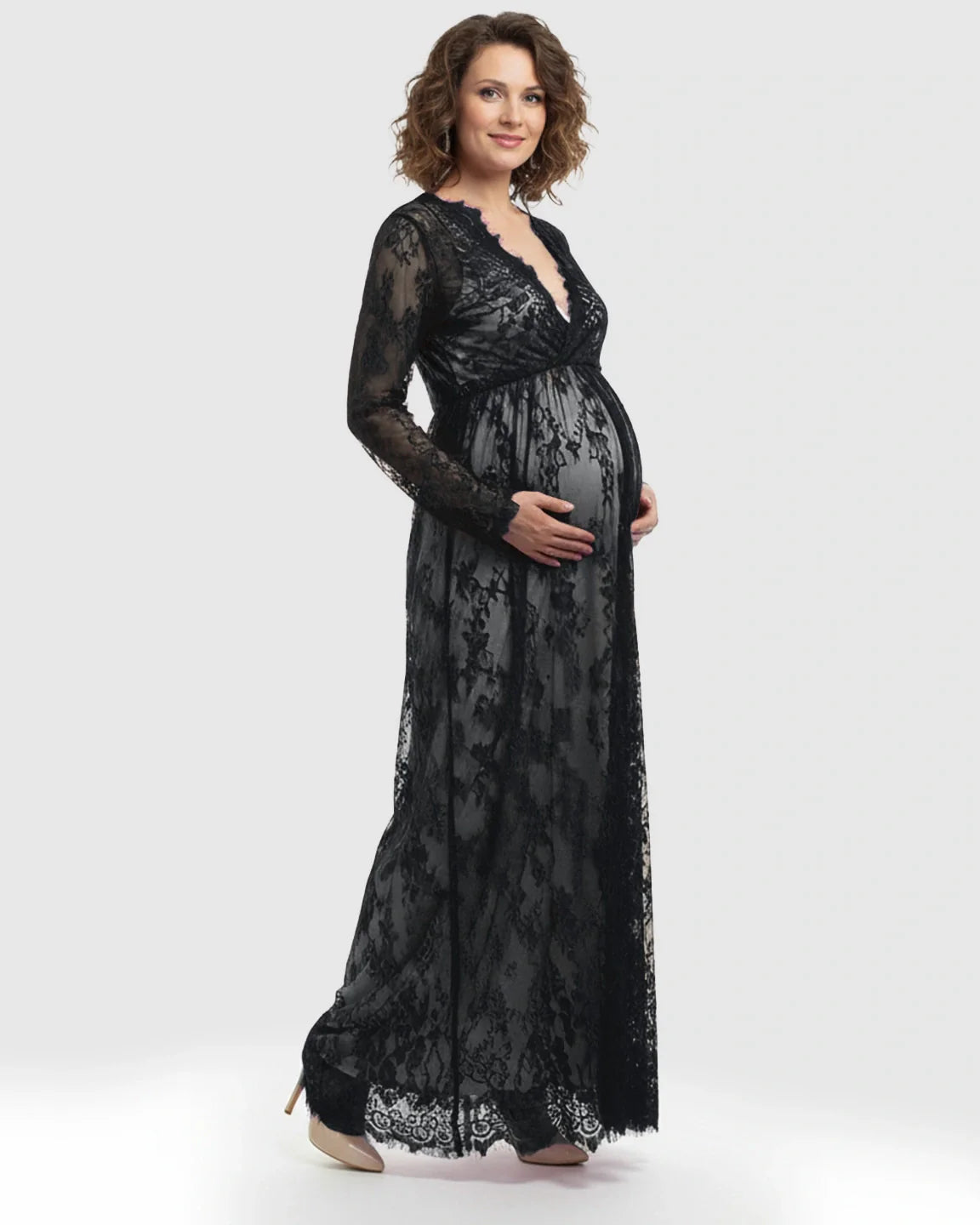 Maternity maxi dress in black sheer floral lace, featuring an empire waist, V-neck, and long sleeves.