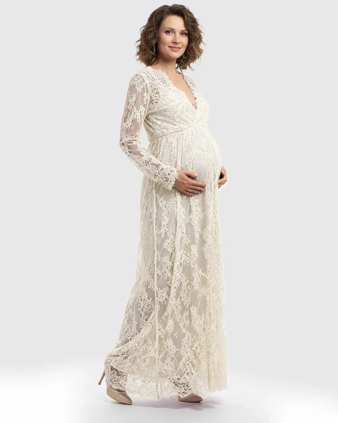 Maternity maxi dress in sheer floral lace, featuring an empire waist, V-neck, and long sleeves.