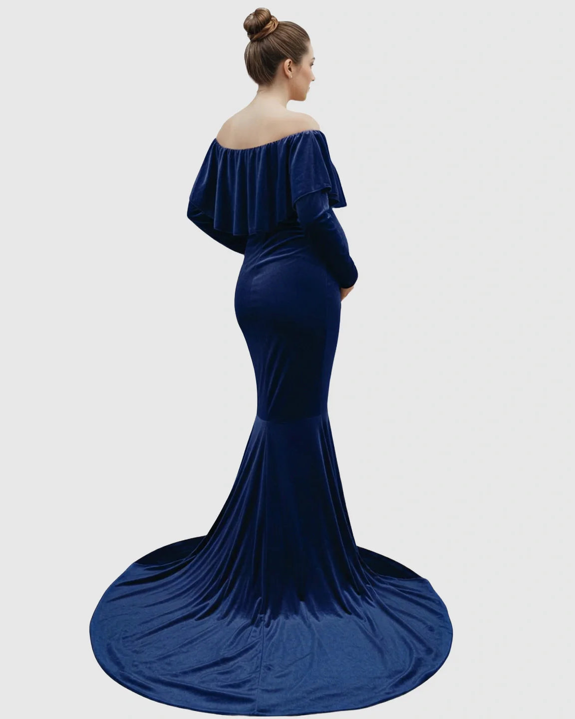 Elegant navy velvet off-shoulder fitted maternity gown with a flowing train, seen from behind.