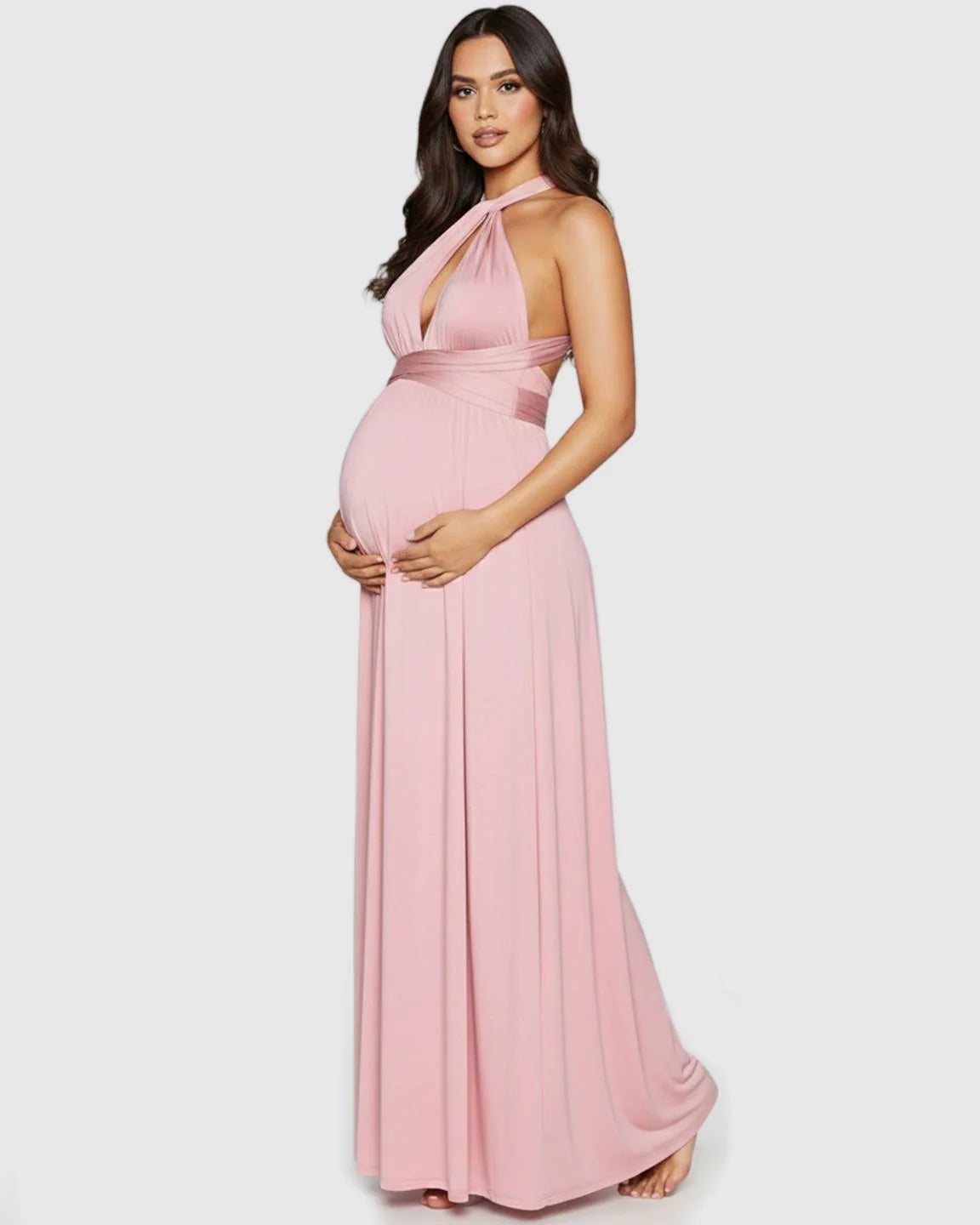Pink tie-waist flowy maternity maxi dress with halter neckline and open back.