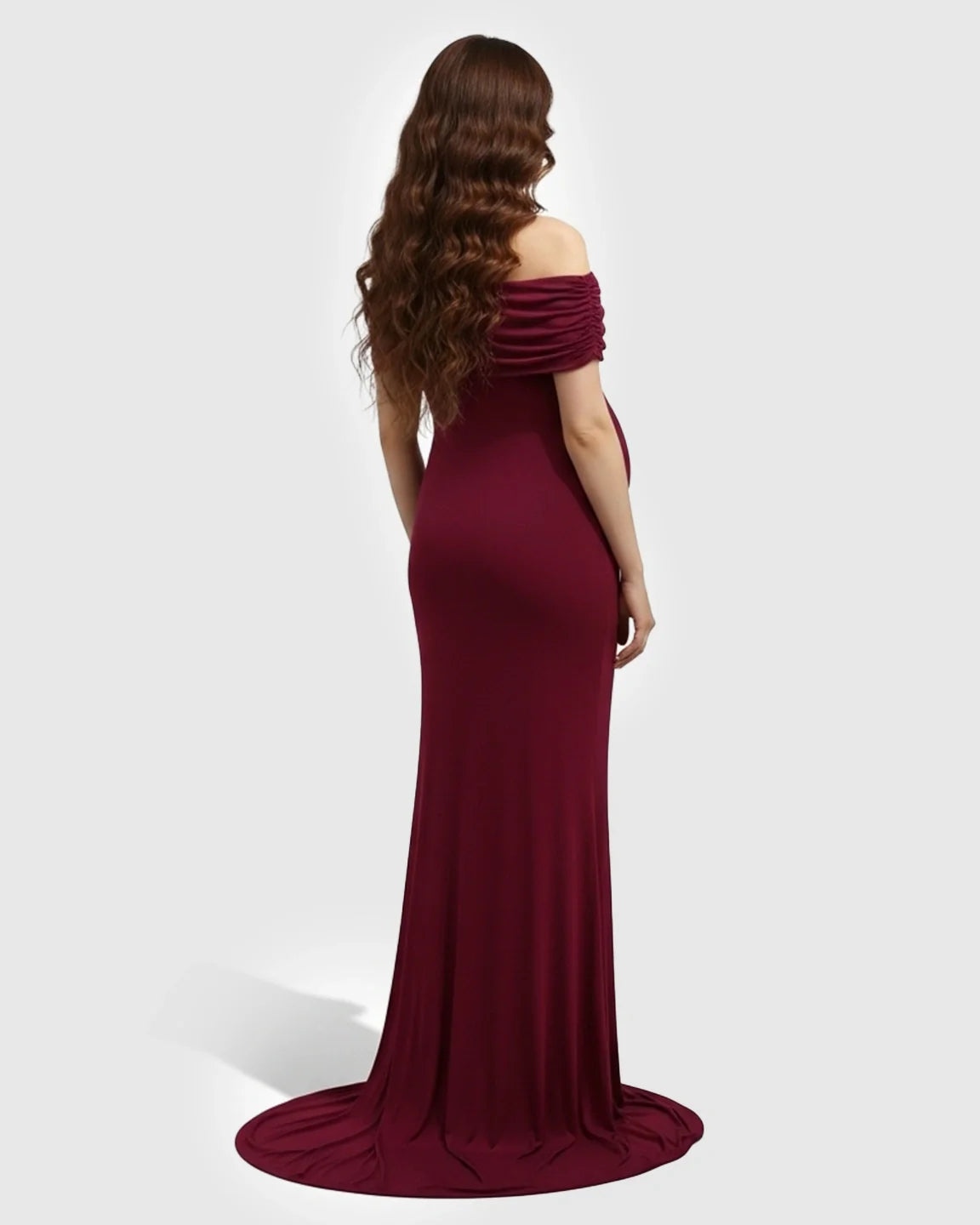 Burgundy off-shoulder bodycon maternity mermaid gown with a dramatic skirt, seen from the back.