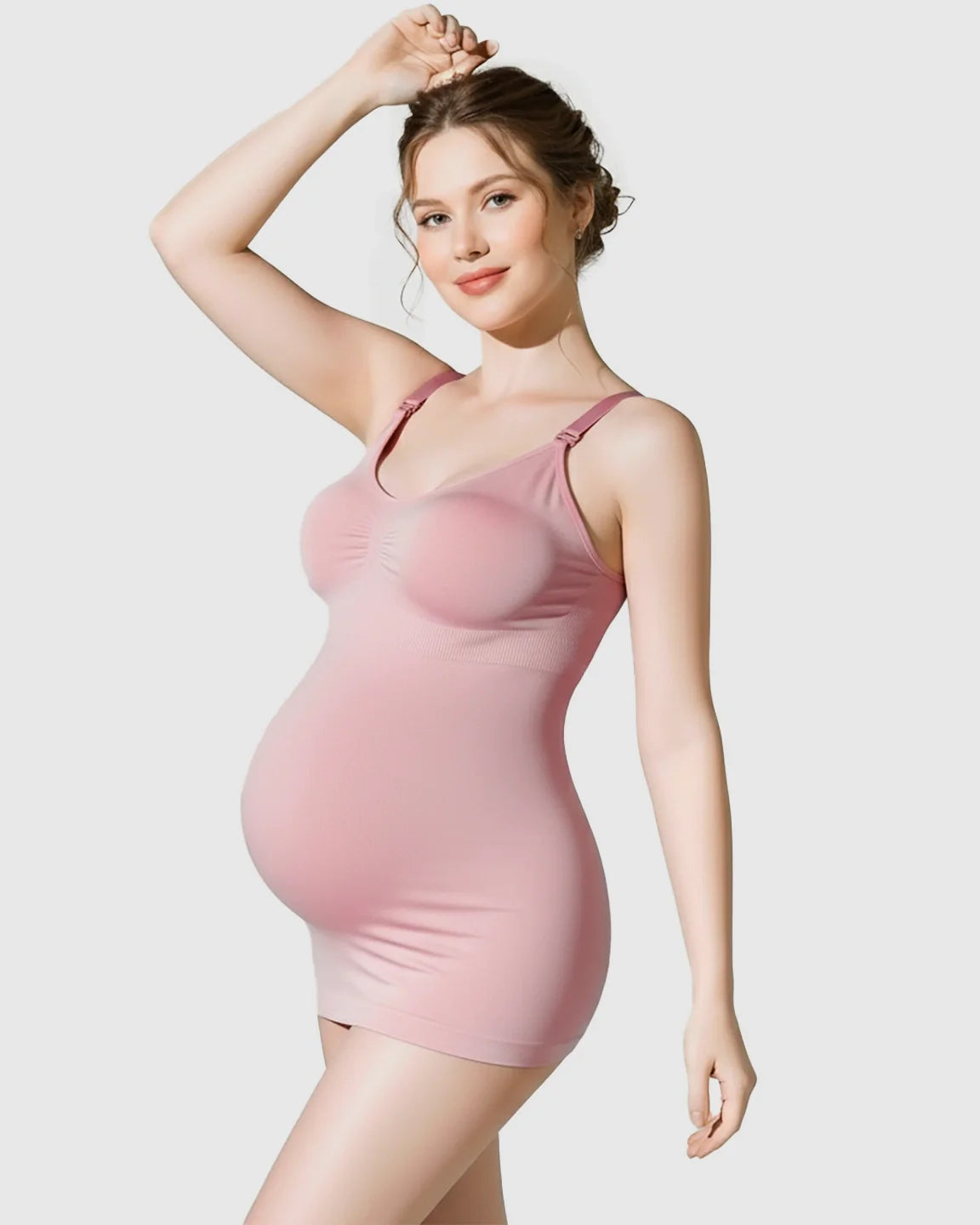 Pregnant woman in a pink soft stretch front-opening wireless maternity nursing bra and camisole.