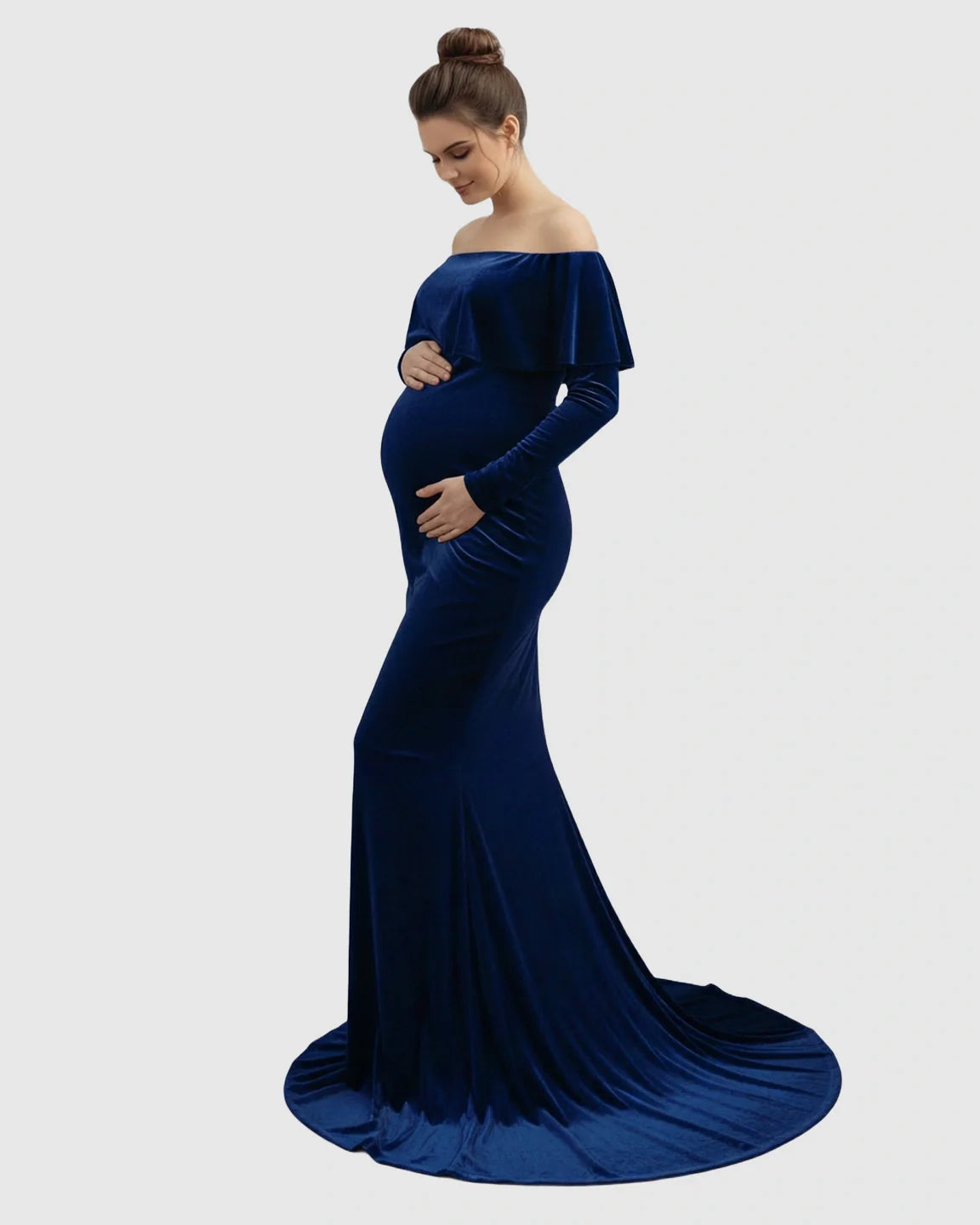 Elegant navy velvet off-shoulder maternity gown with long sleeves, fitted silhouette, and flowing train.