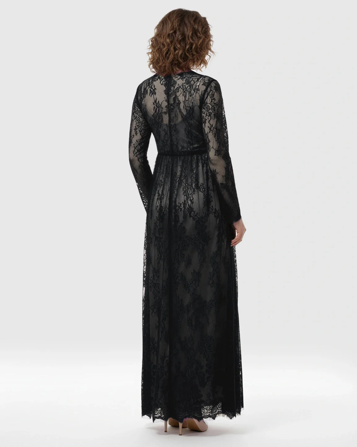 Black sheer floral lace empire waist maternity maxi dress with long sleeves.