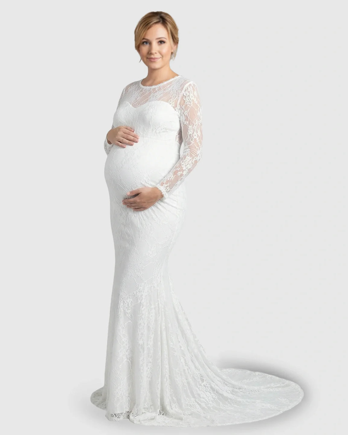 White sheer lace trumpet maternity gown with long sleeves and mermaid-style skirt.