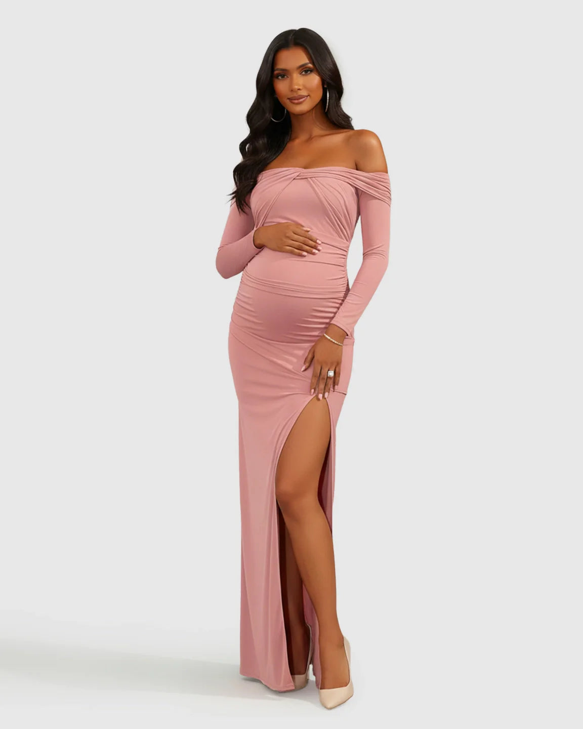Pink ruched off-shoulder long-sleeve bodycon maternity dress with a high slit.