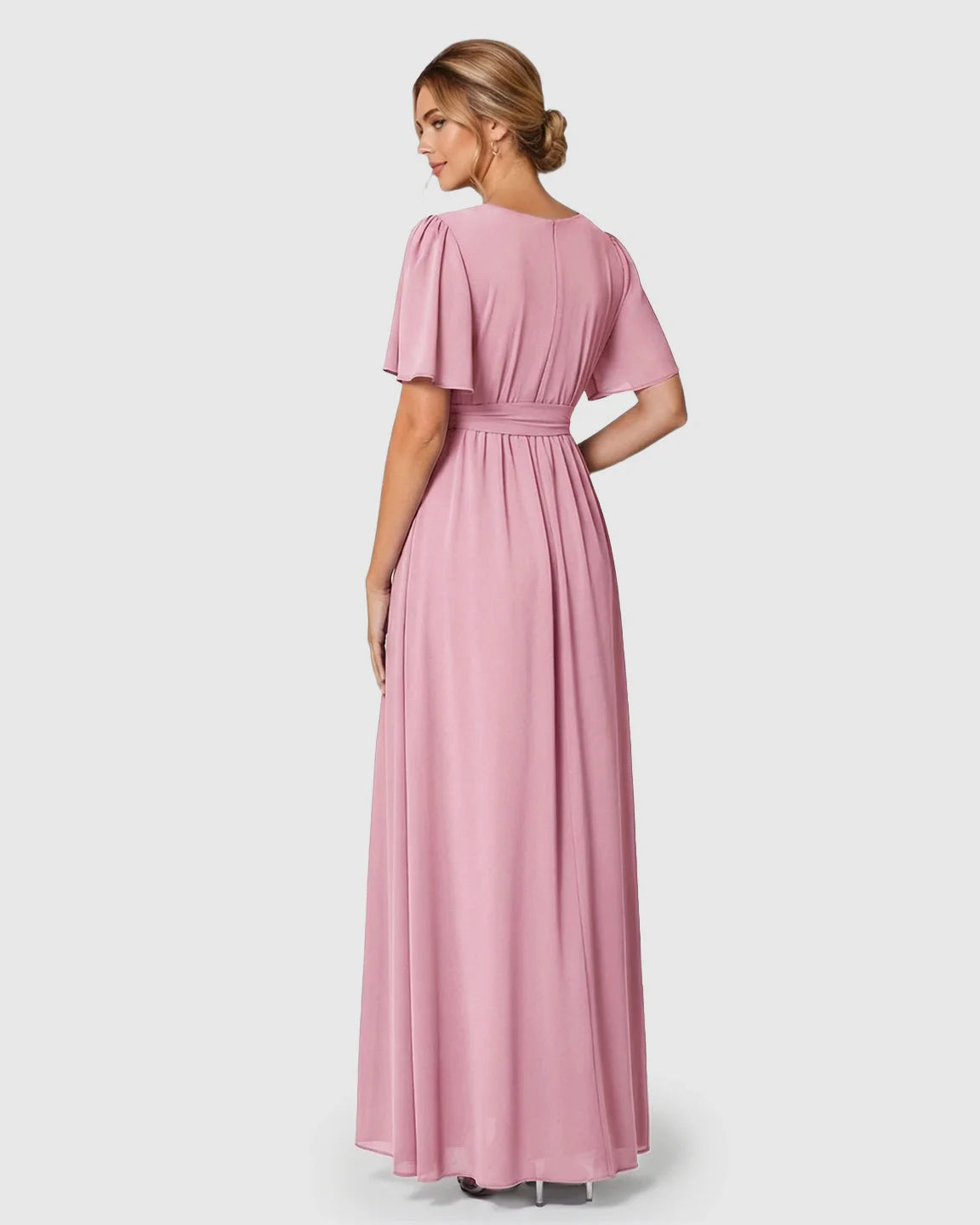 Pink V-neck flutter sleeve maternity maxi dress with empire waist and flowing skirt.