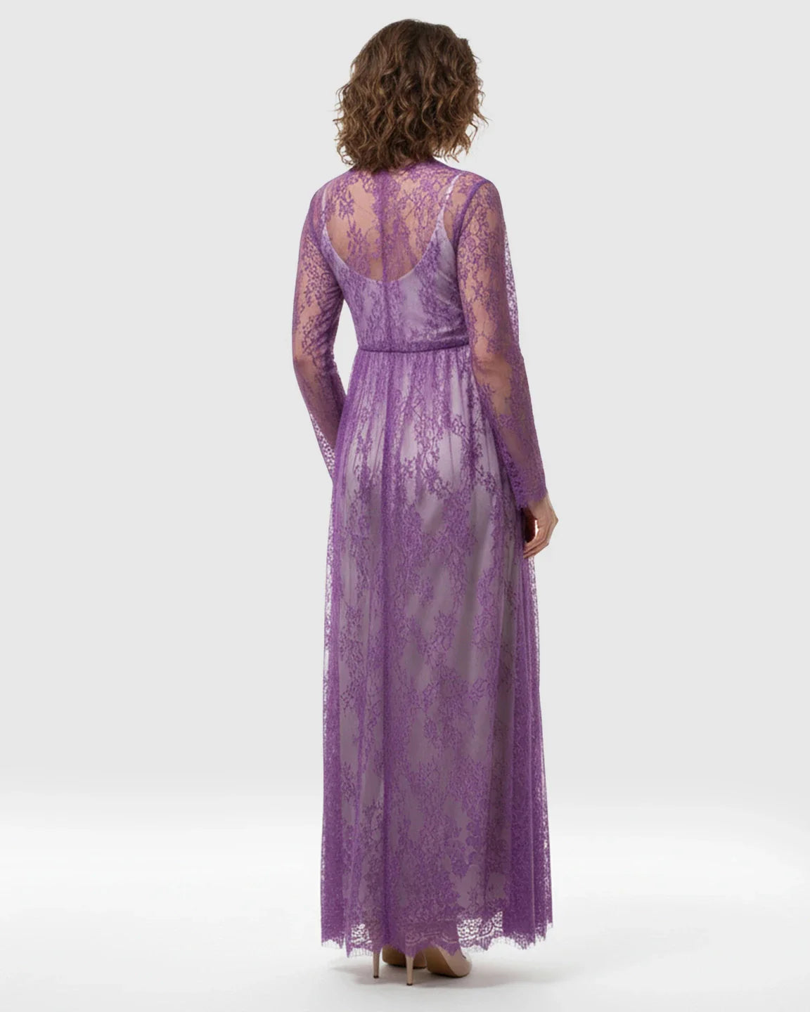 Purple sheer floral lace empire waist maternity maxi dress with long sleeves.