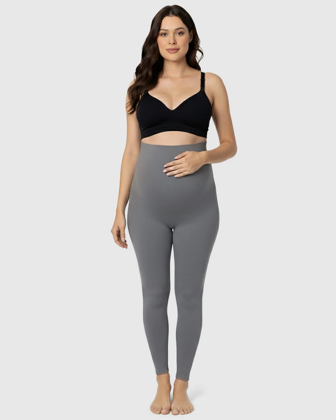 Woman in gray Bump Society Belly Support Stretch Maternity Leggings with high waist panel.