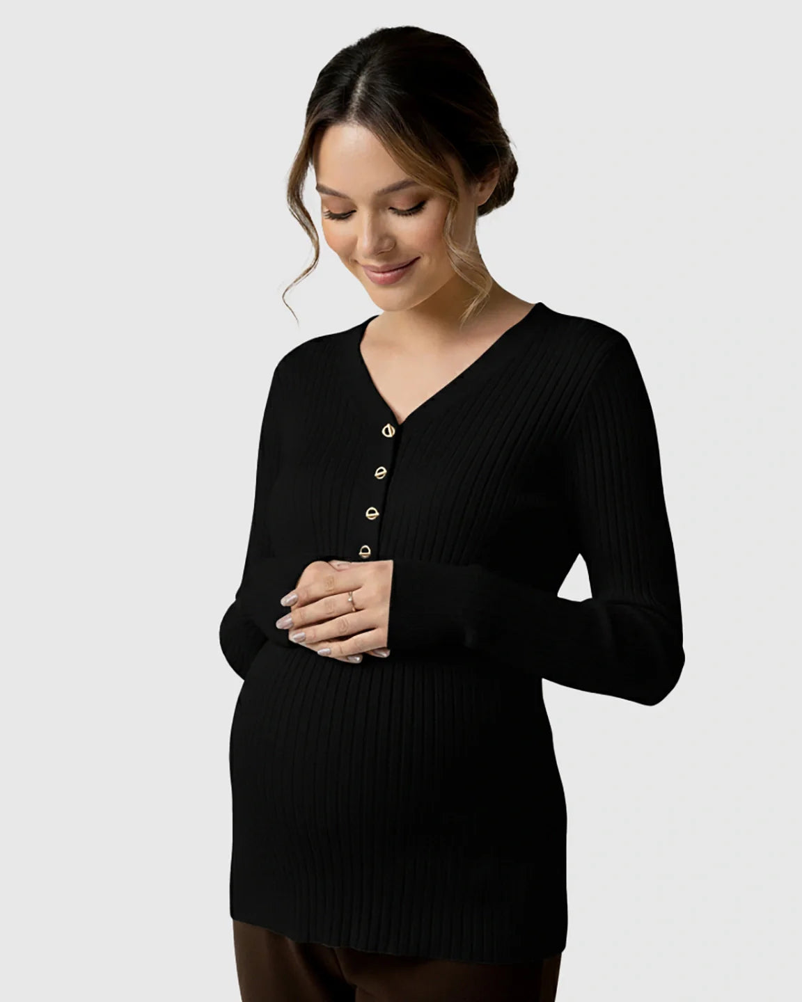 Black ribbed V-neck maternity nursing sweater with gold buttons, worn by a smiling pregnant woman.