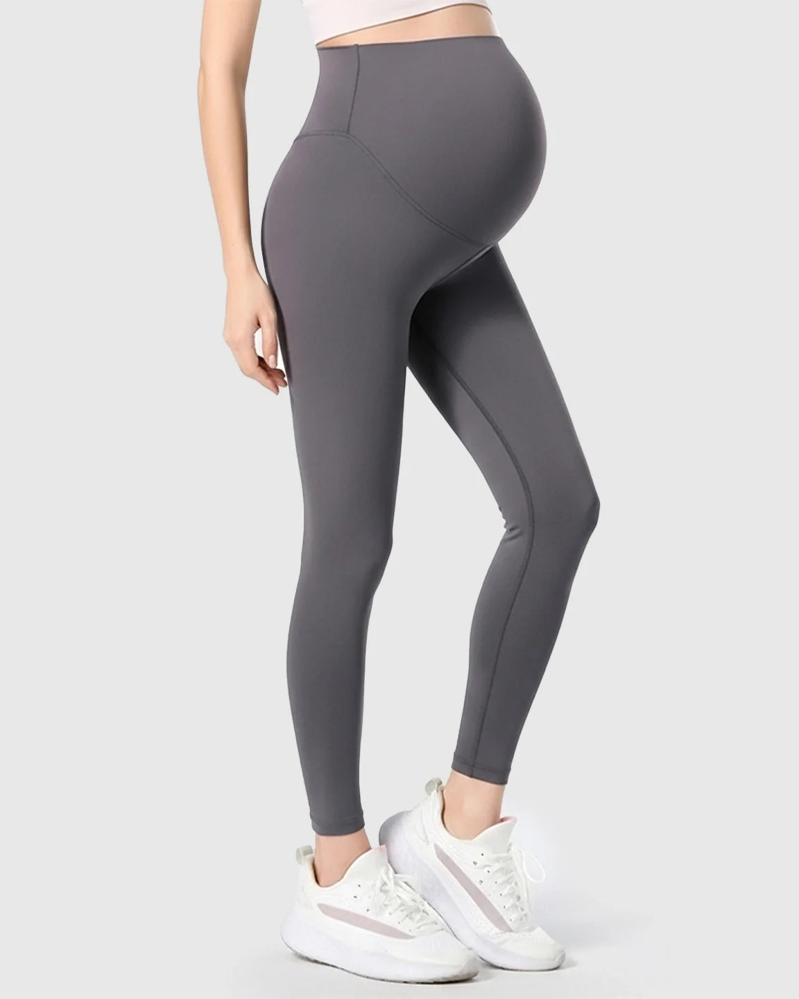 Gray double-layer belly support maternity leggings with a shark gill panel, worn by a pregnant woman.
