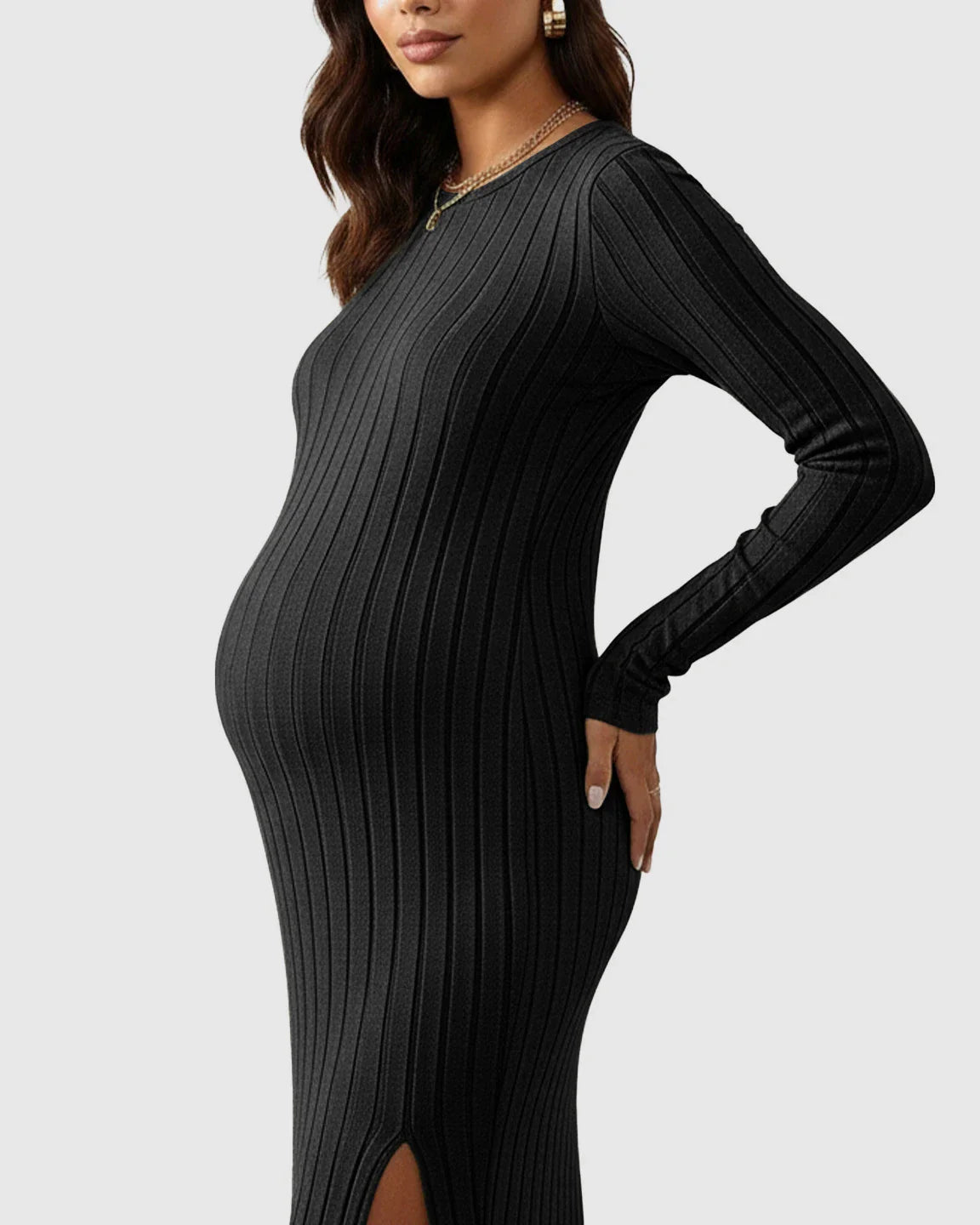 Black ribbed knit fitted maternity maxi dress with long sleeves and crew neckline.