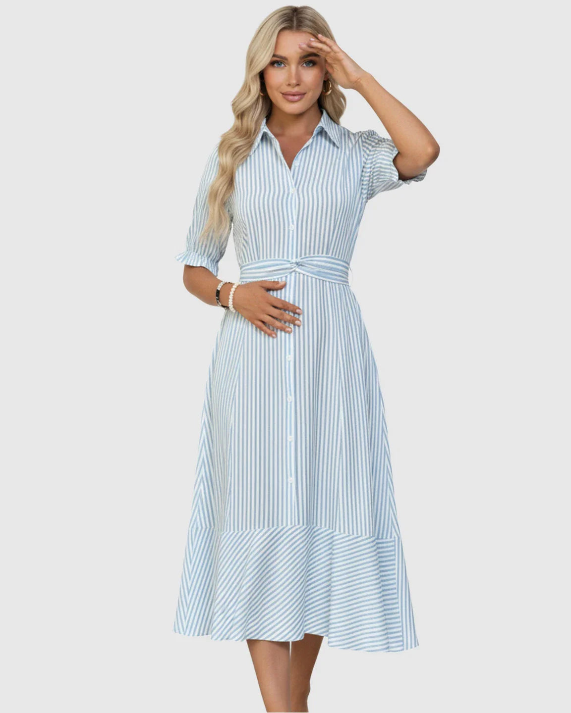 Blonde woman in a blue and white striped lapel puff-sleeve A-line maternity dress with a tie waist.