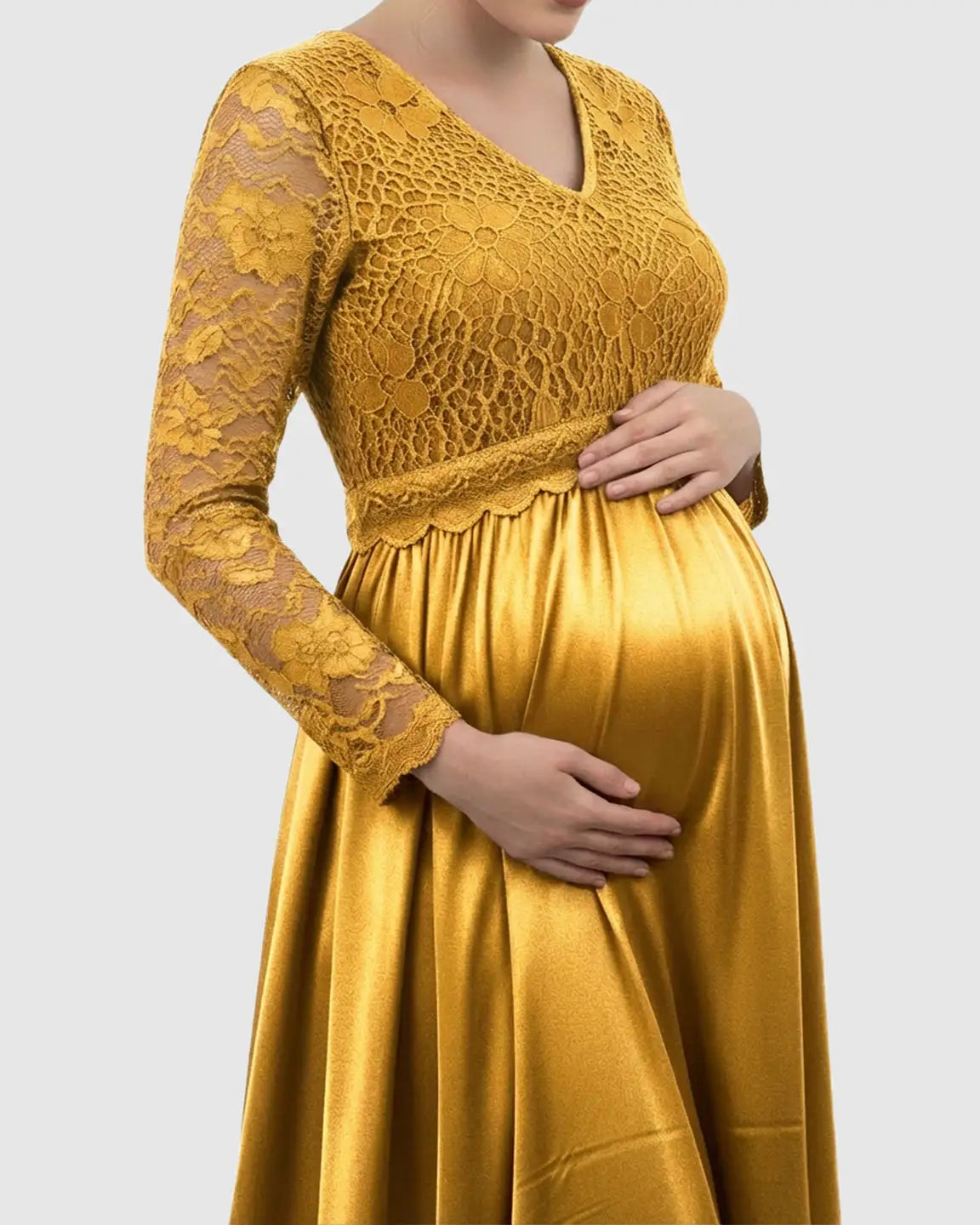 Mustard yellow maternity maxi dress with lace-spliced bodice, V-neck, and flowing satin skirt.