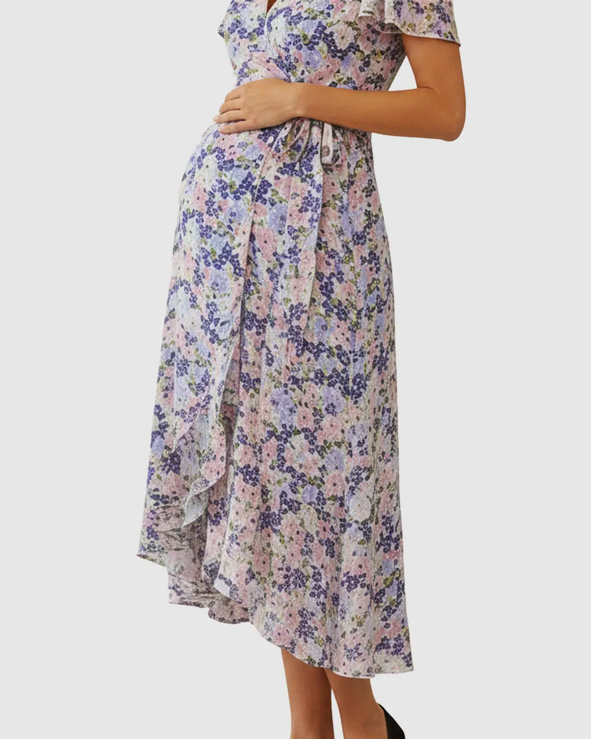 Floral V-neck wrap-style maternity midi dress with flutter sleeves and adjustable tie waist.