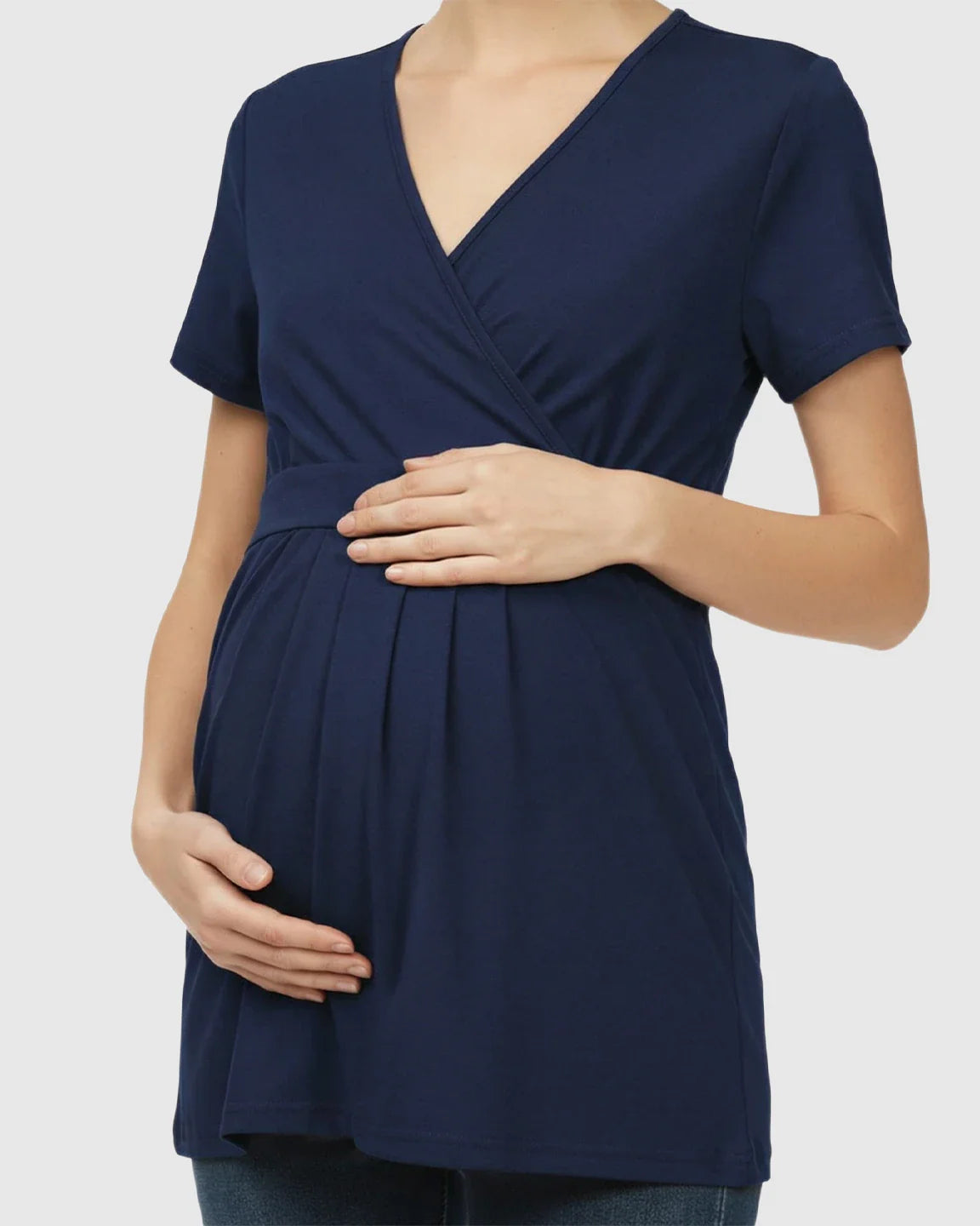 Navy V-neck wrap-style maternity top with short sleeves, adjustable waist tie, and pleated bump.