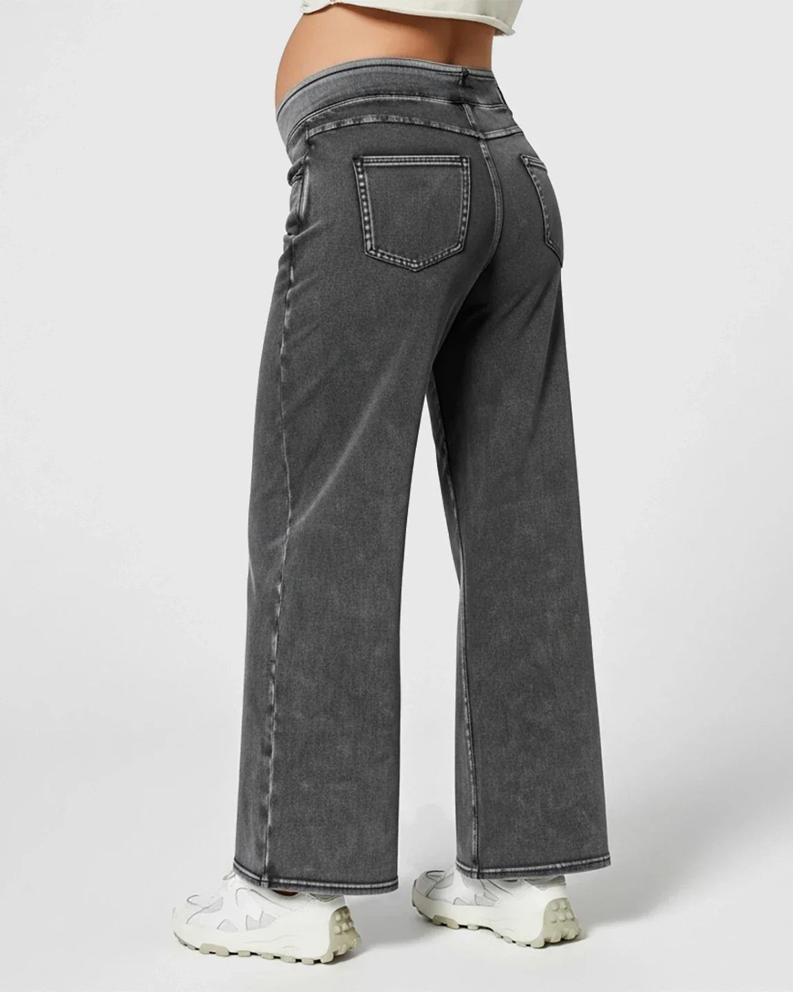 Dark grey high-waist wide-leg maternity denim jeans with a soft, stretchy waistband and back pockets.