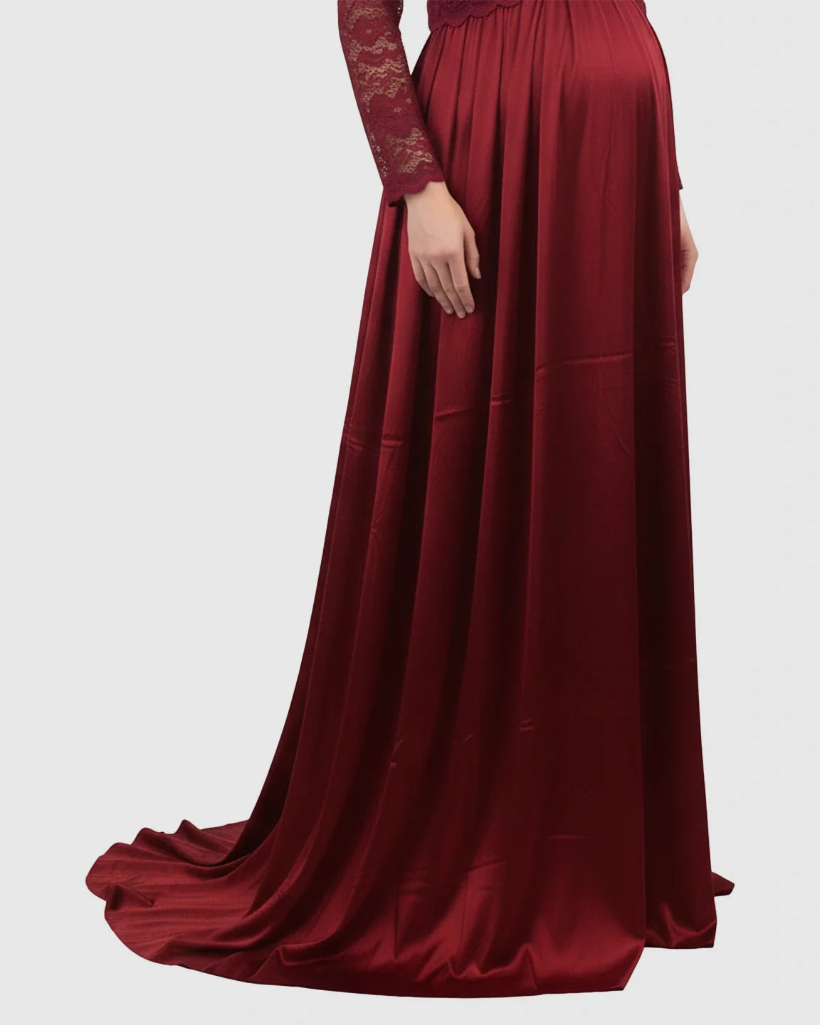 Red lace-spliced bodice and trailing skirt maternity photoshoot maxi dress.