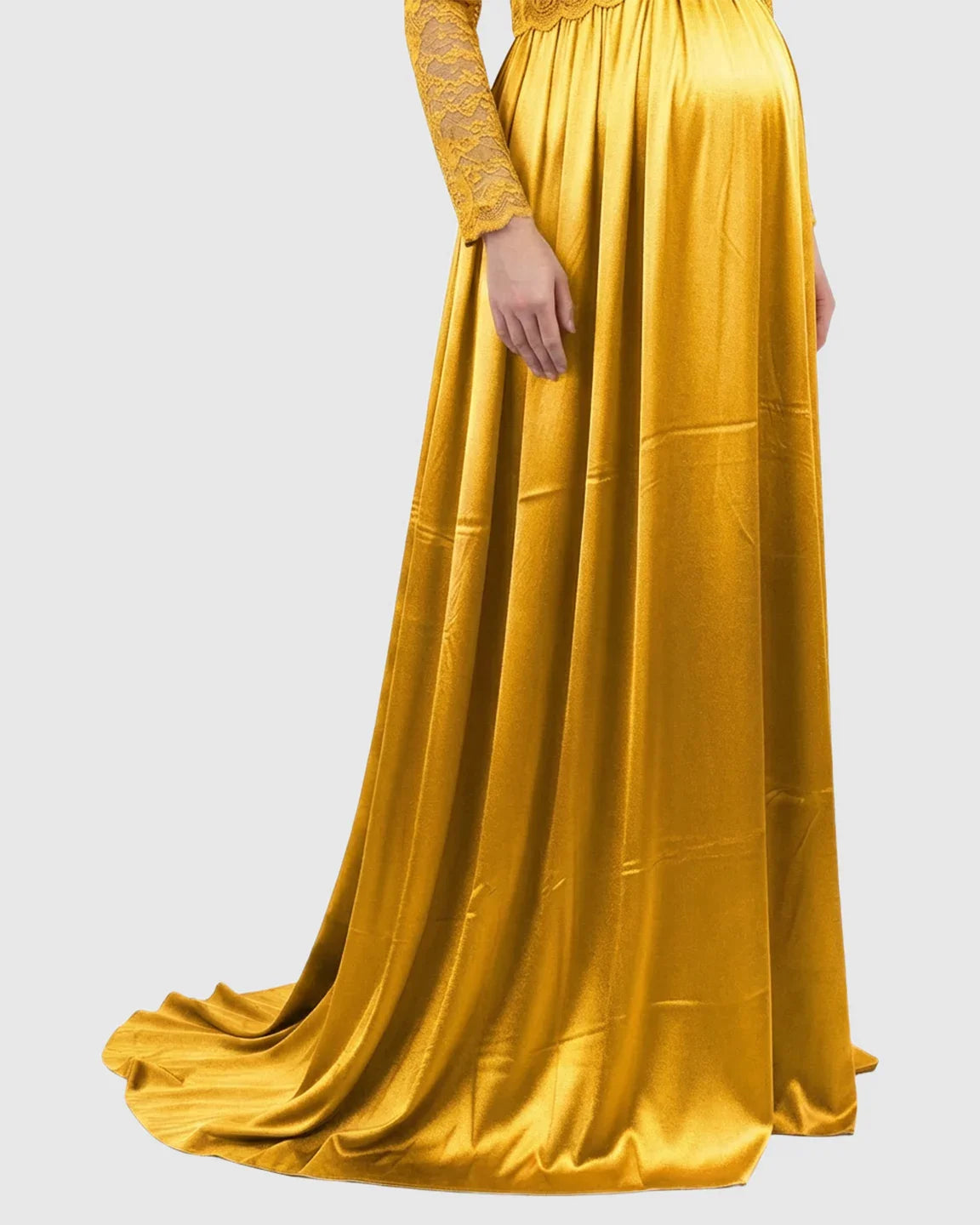 Golden maternity maxi dress with lace-spliced bodice and flowing trailing skirt.