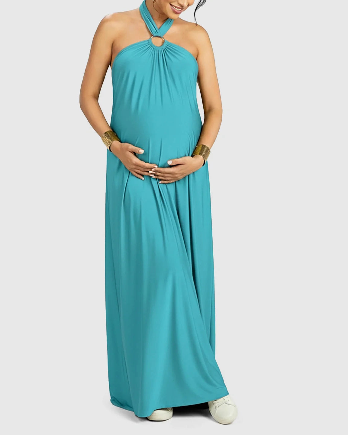 Turquoise backless halter neck chiffon maternity maxi dress with a gold ring detail.