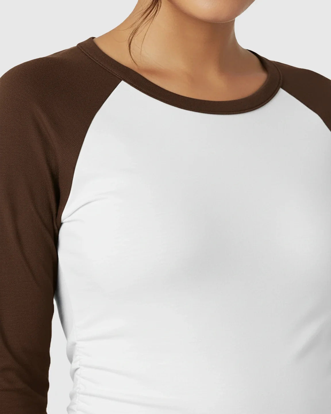 White and brown raglan sleeve maternity top with ruched sides, made from smooth, high-elastic polyester.