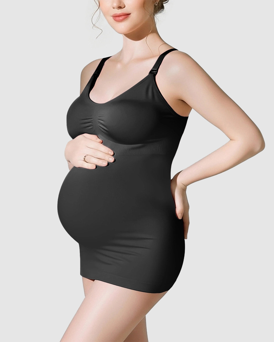 Pregnant woman in a black soft stretch front-opening wireless maternity nursing bra and matching camisole.