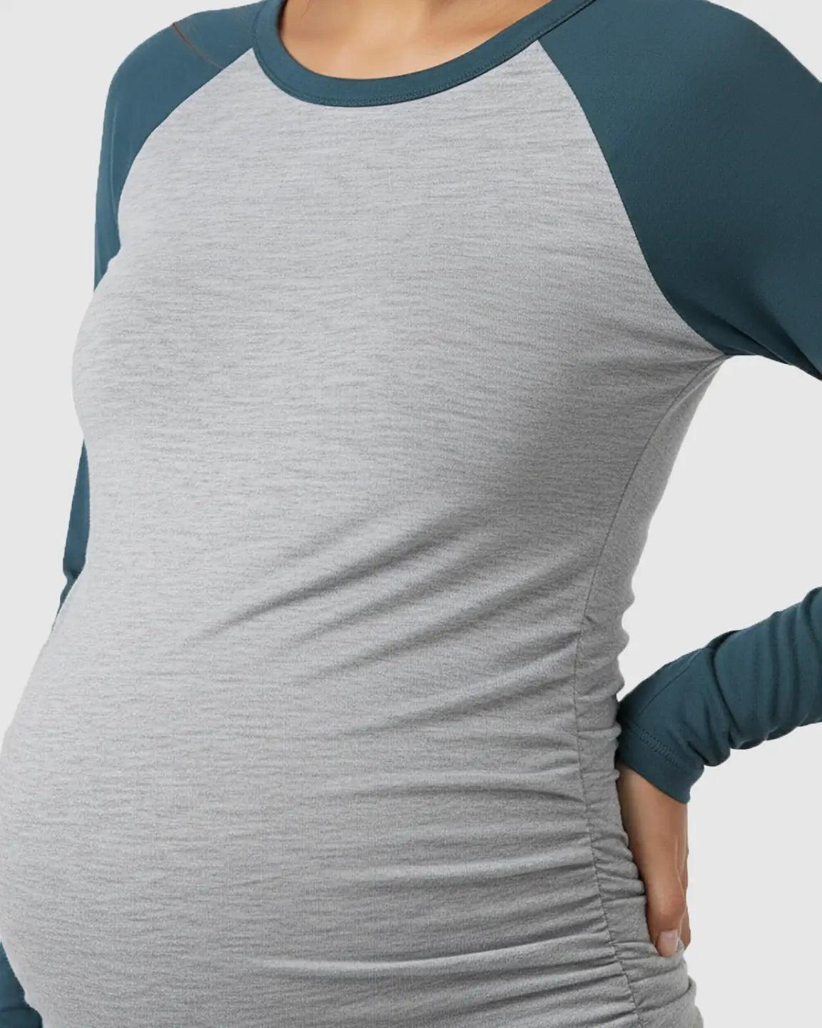 Gray and teal stretch-fit long-sleeve maternity top with raglan sleeves and side ruching.