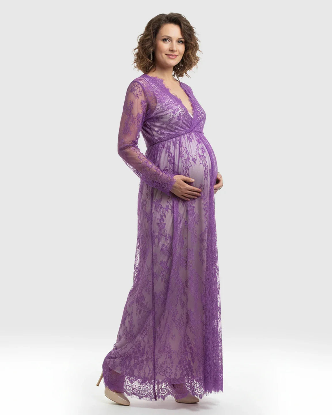 Maternity maxi dress in sheer floral purple lace with empire waist, long sleeves, and V-neck.