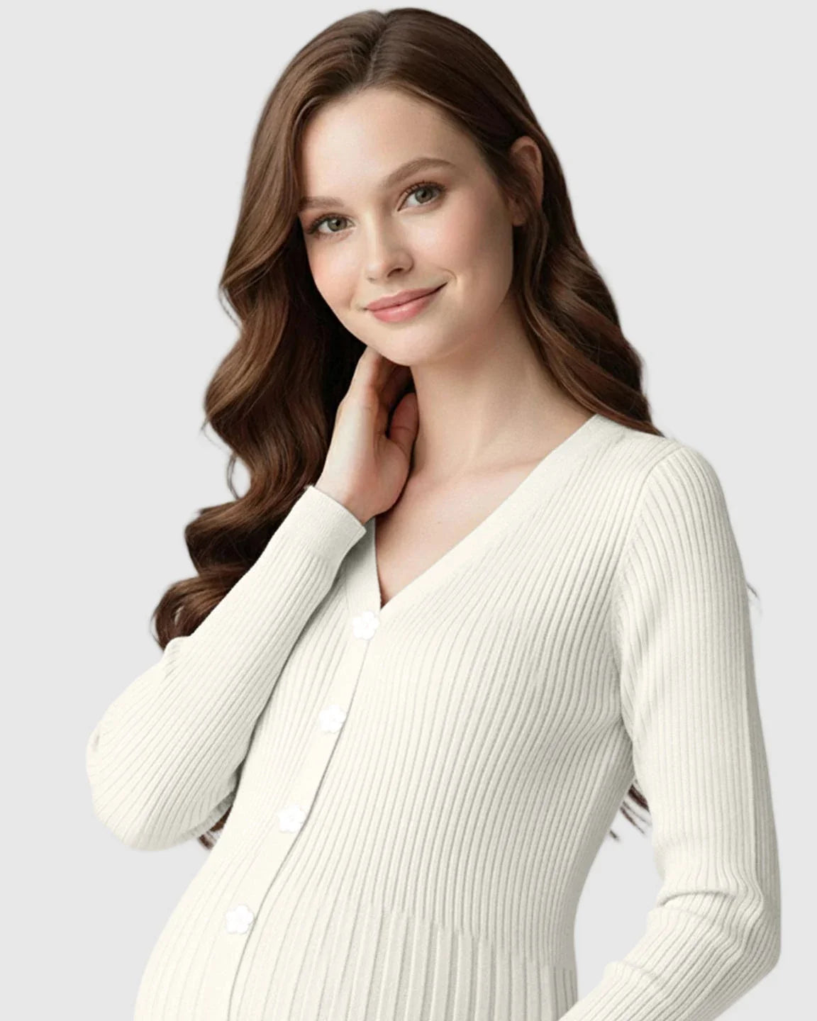 Smiling woman in a white ribbed knit maternity midi dress with long sleeves and V-neck.