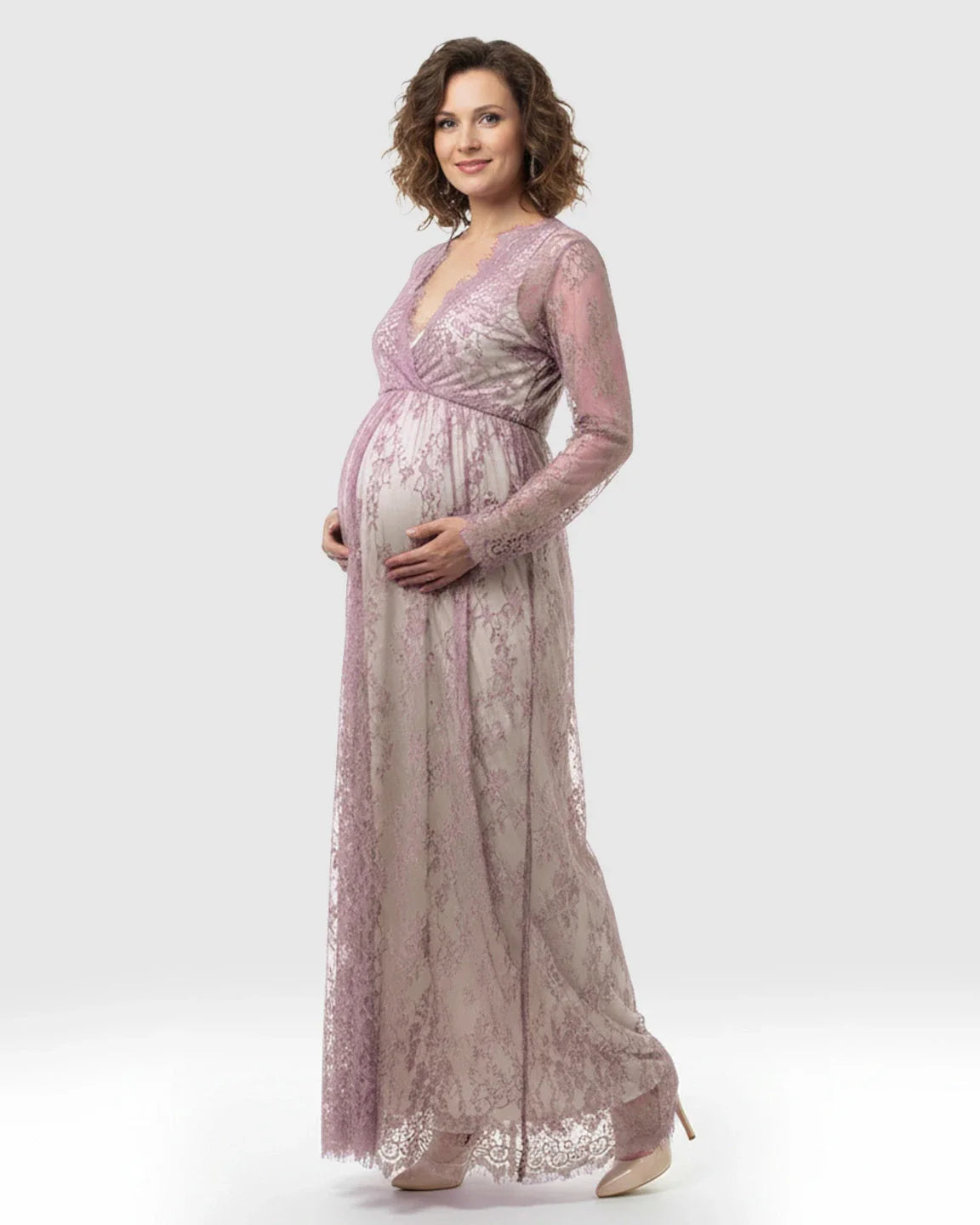 Maternity maxi dress in sheer floral lace, featuring an empire waist and long sleeves, in a soft lavender hue.