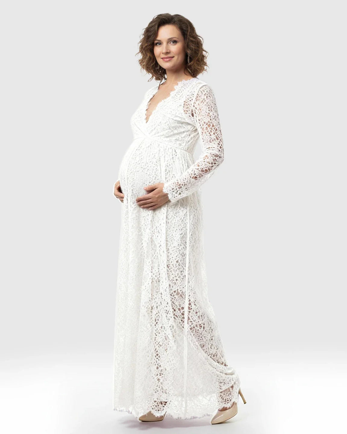 White sheer floral lace empire waist maternity maxi dress with long sleeves.