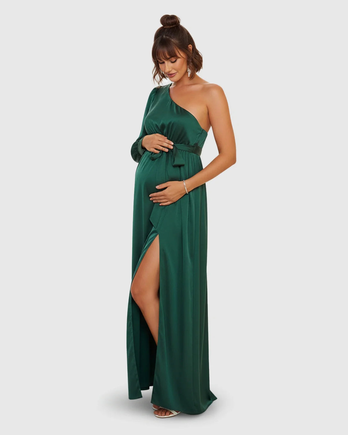 Elegant emerald green satin one-shoulder maternity maxi dress with a high slit and tie-waist.