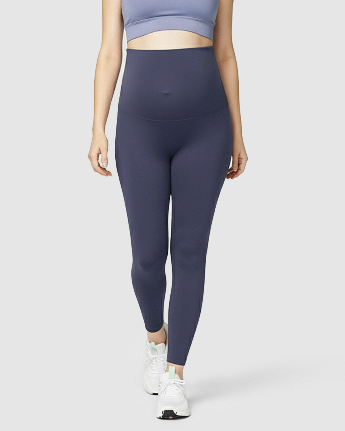 Navy blue soft stretch maternity leggings with a high-waist design providing bump support.