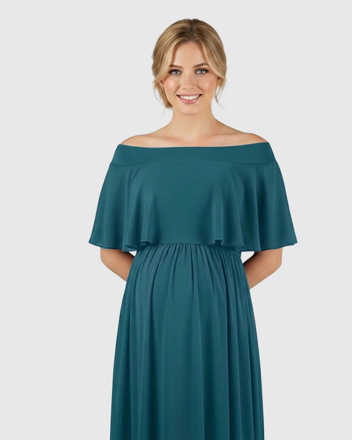 Teal off-shoulder bohemian maternity photoshoot dress with a flowy chiffon silhouette and ruffled top.