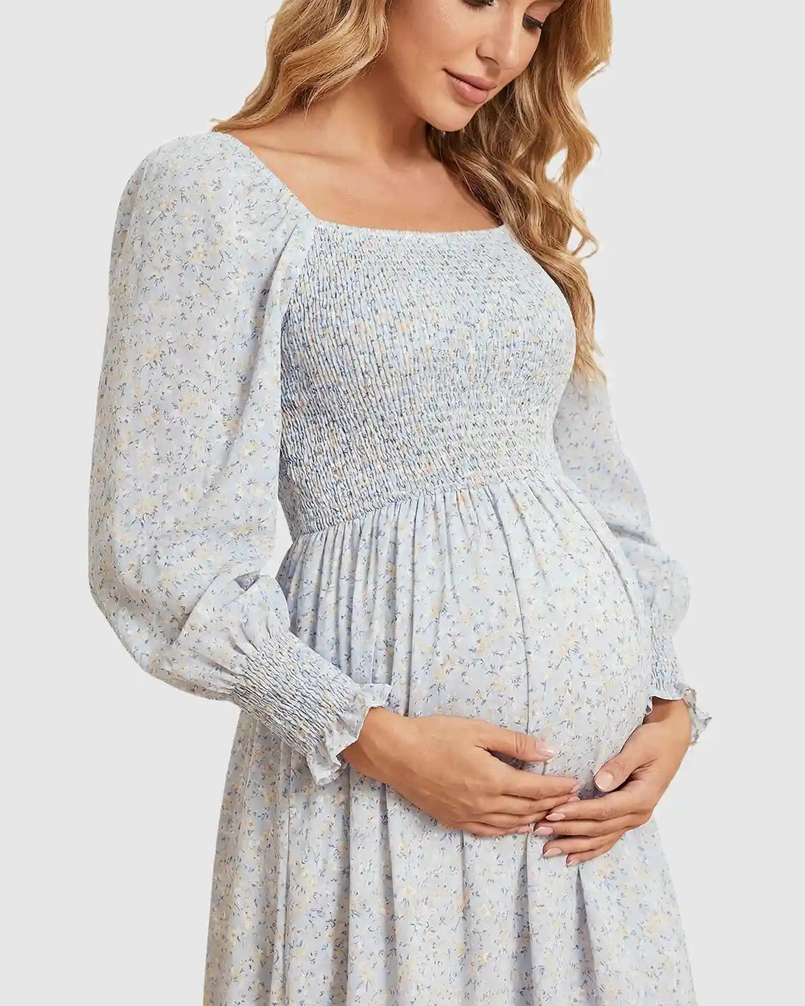 Maternity midi dress: light blue floral print, smocked bodice, square neck, long sleeves, comfortable fit.