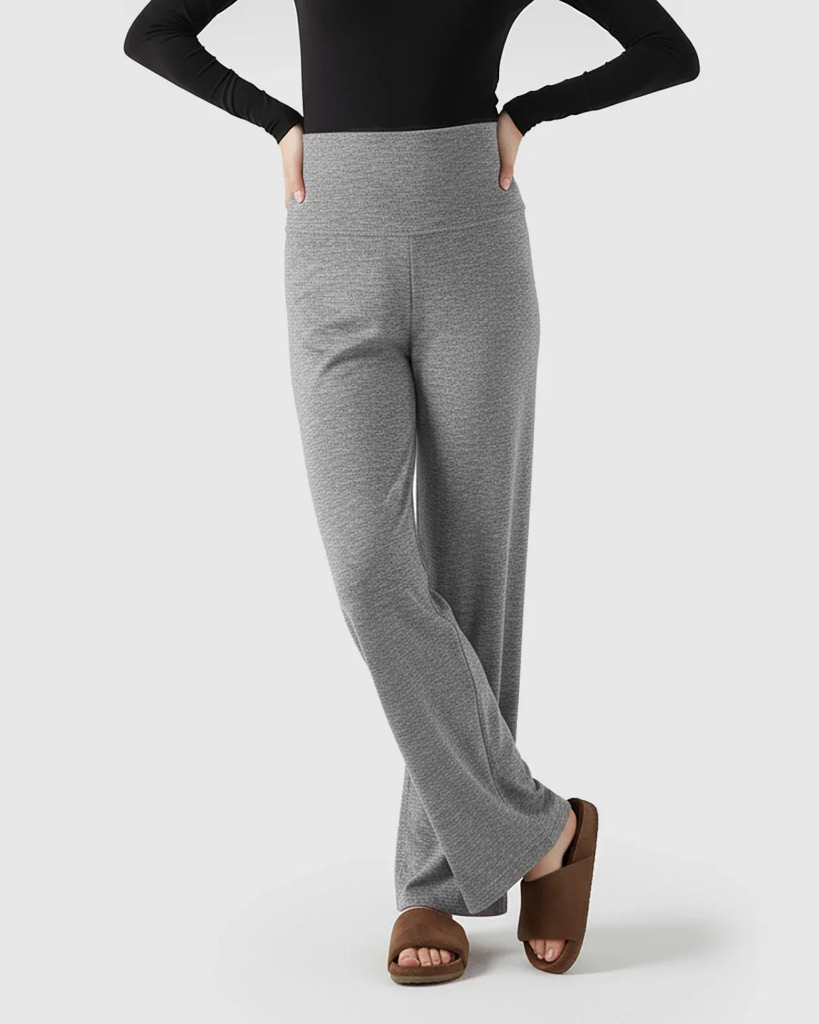 Gray heather fleece-lined maternity pants with an over-belly waistband and wide-leg silhouette.
