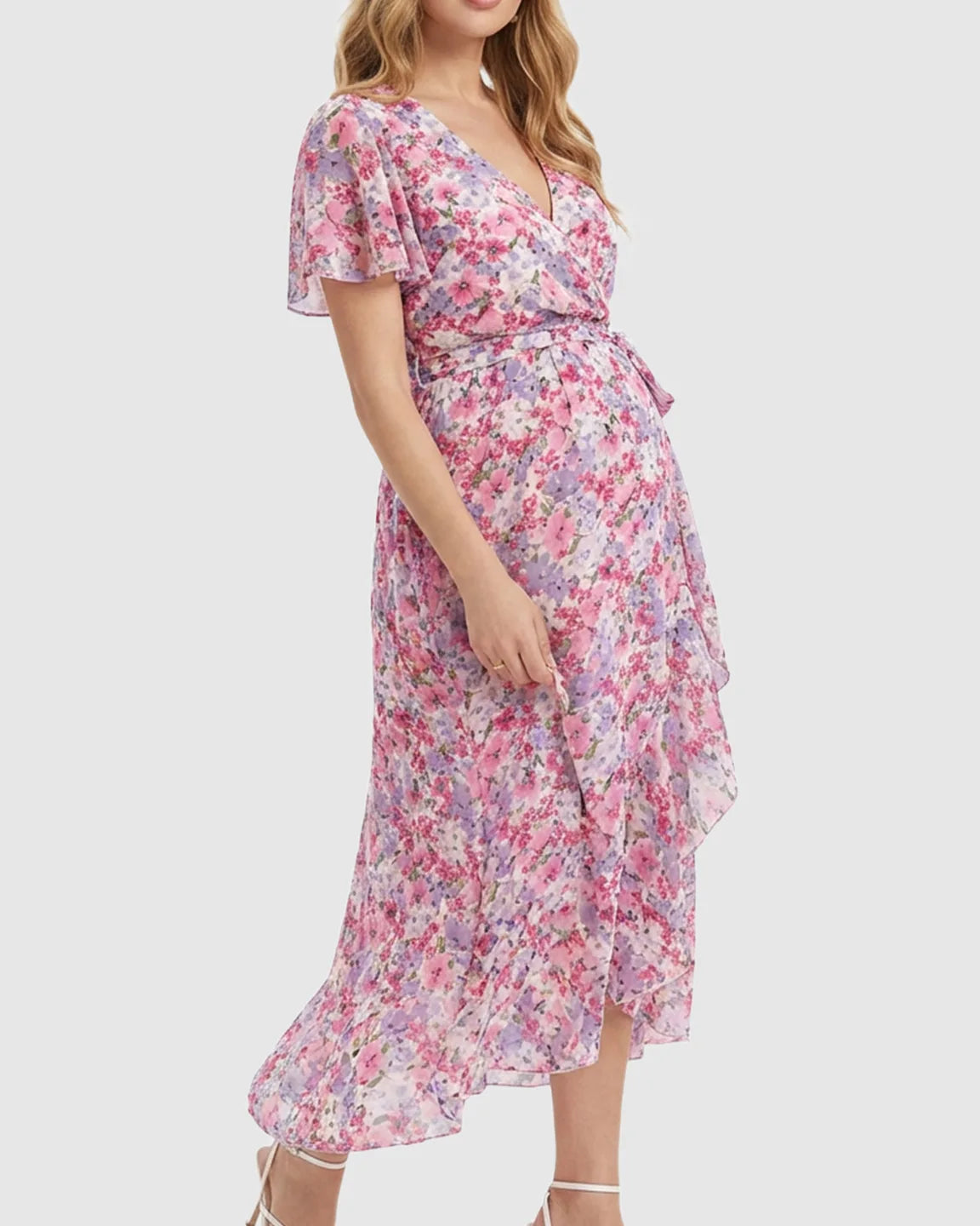 Floral V-neck ruffled hem maternity midi dress in pink and purple, with a tie waist.