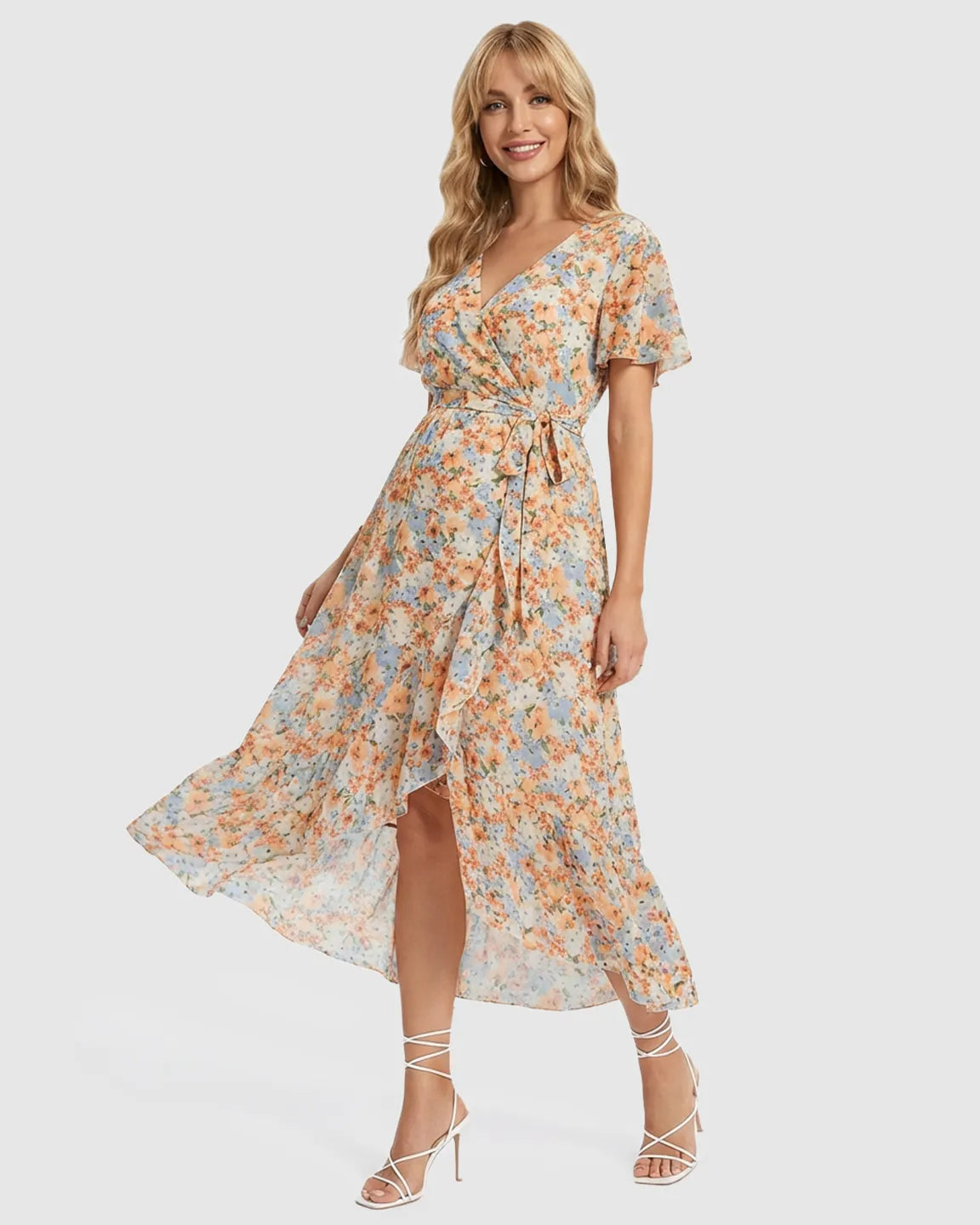 Maternity midi dress with a floral print, V-neck, ruffled hem, and tie waist.